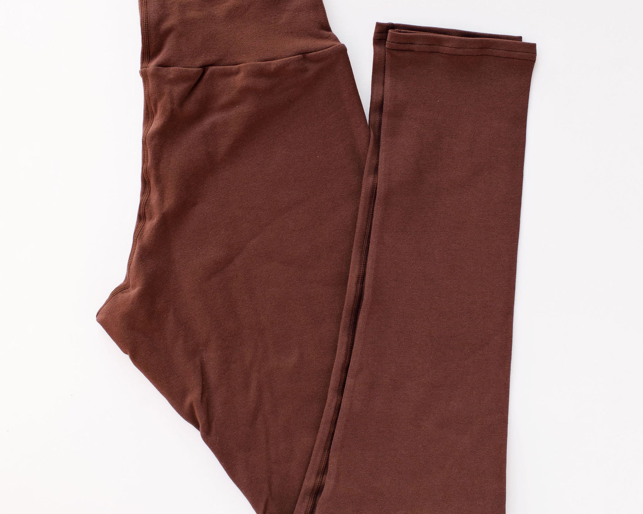 Flat lay of Thunderpants Extra Long Leggings in Chestnut - dark brown color.