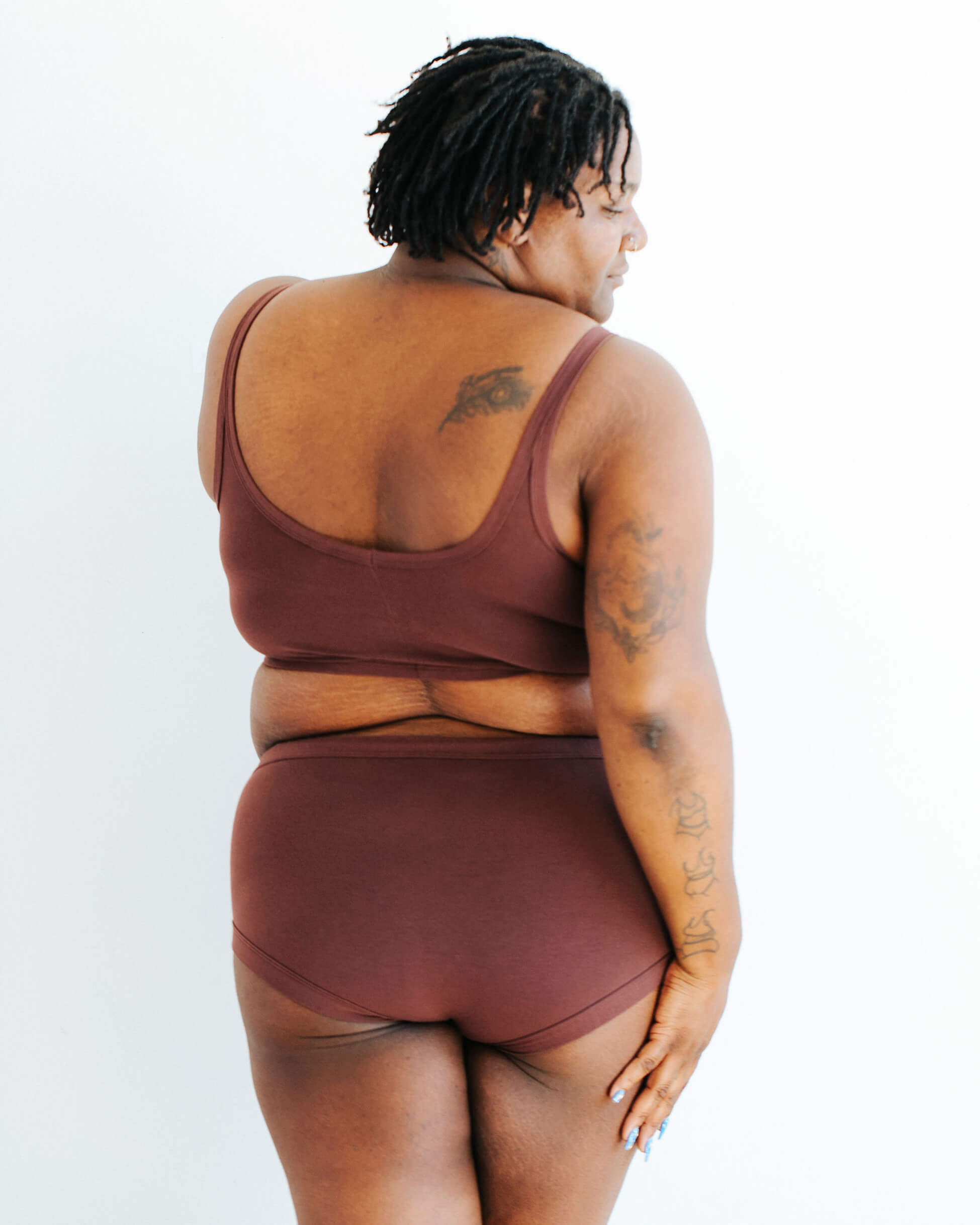 Model wearing Thunderpants Hipster style underwear in Chestnut - a dark brown color.