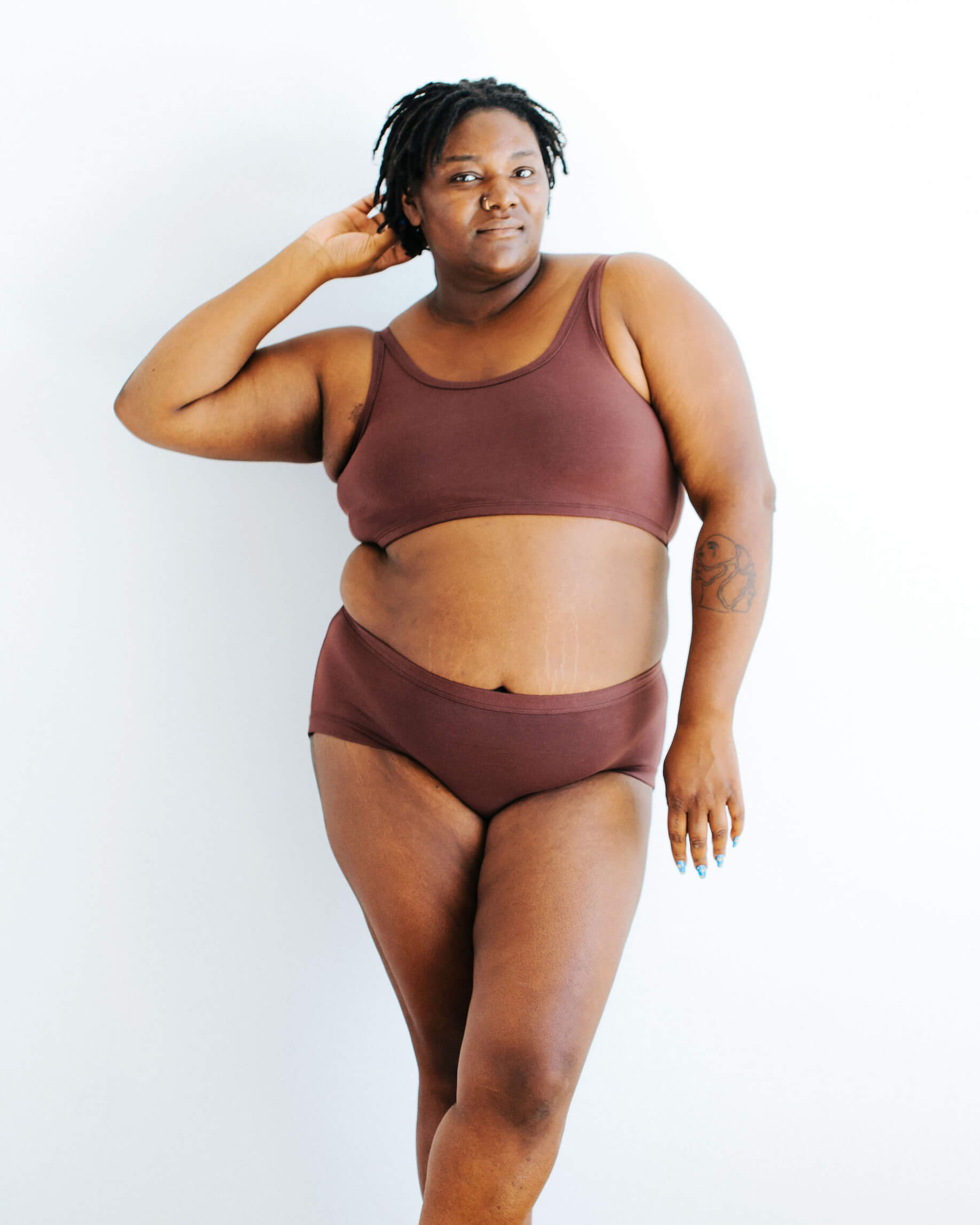 Model wearing Thunderpants Hipster style underwear in Chestnut - a dark brown color.