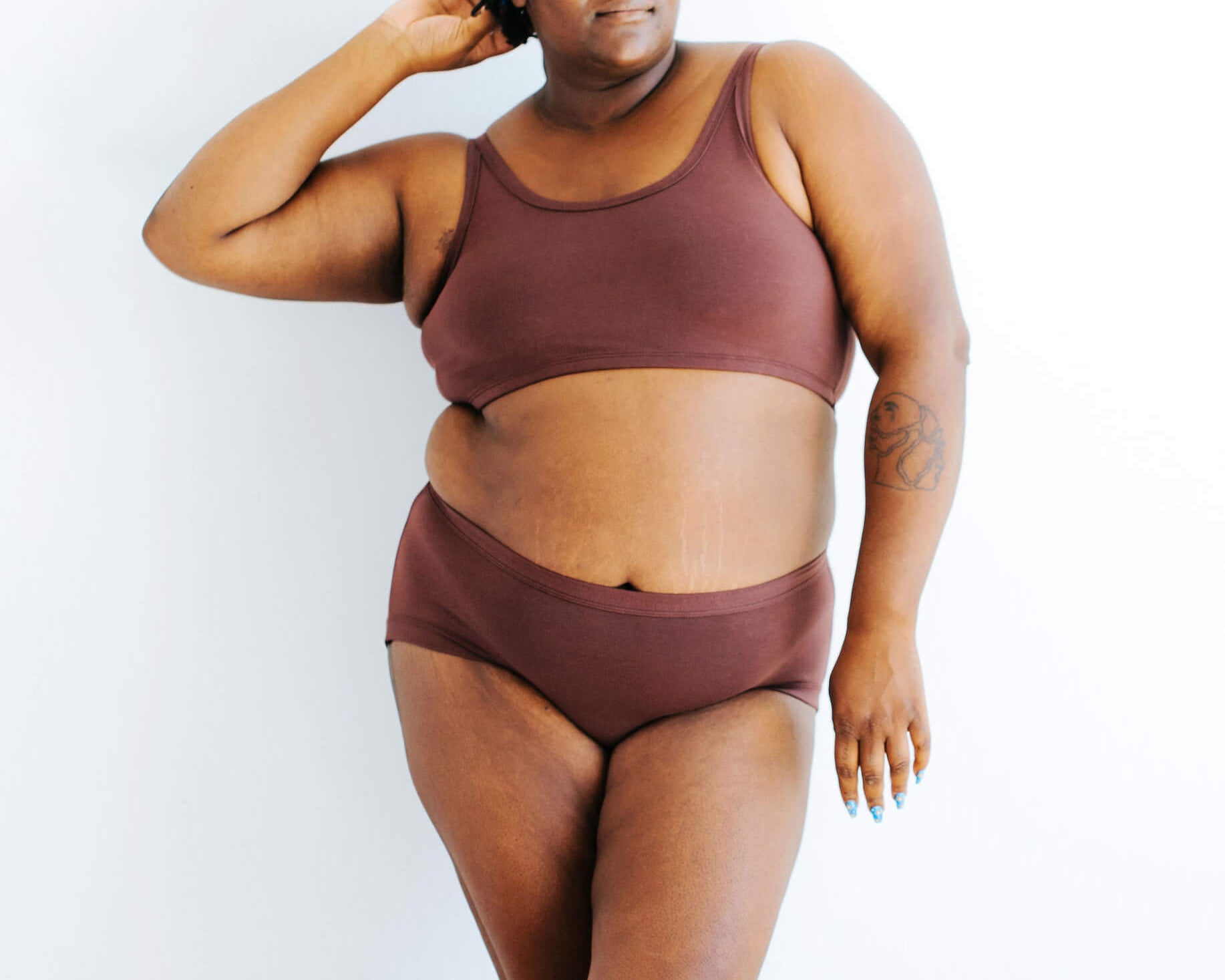 Model wearing Thunderpants Hipster style underwear in Chestnut - a dark brown color.