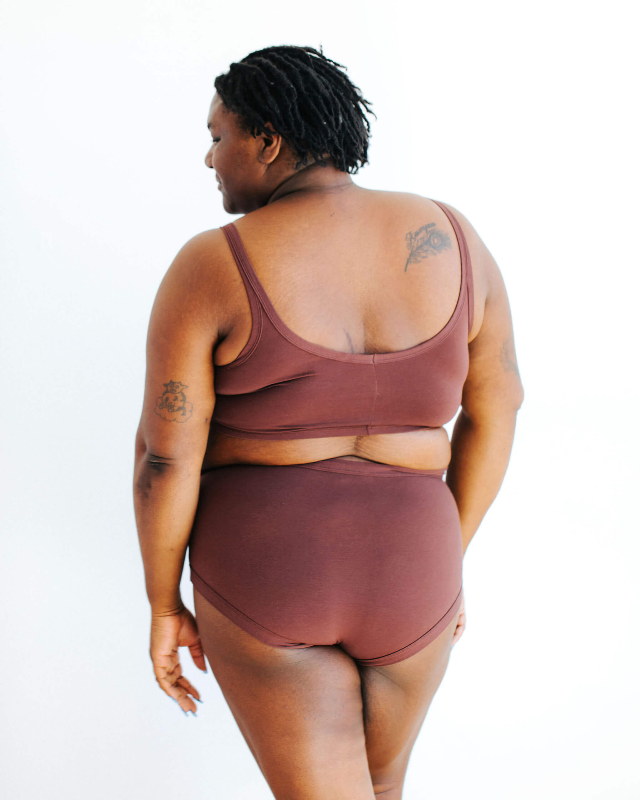 Model wearing Thunderpants Original style underwear and a Longline Bra in Chestnut - a dark brown color.