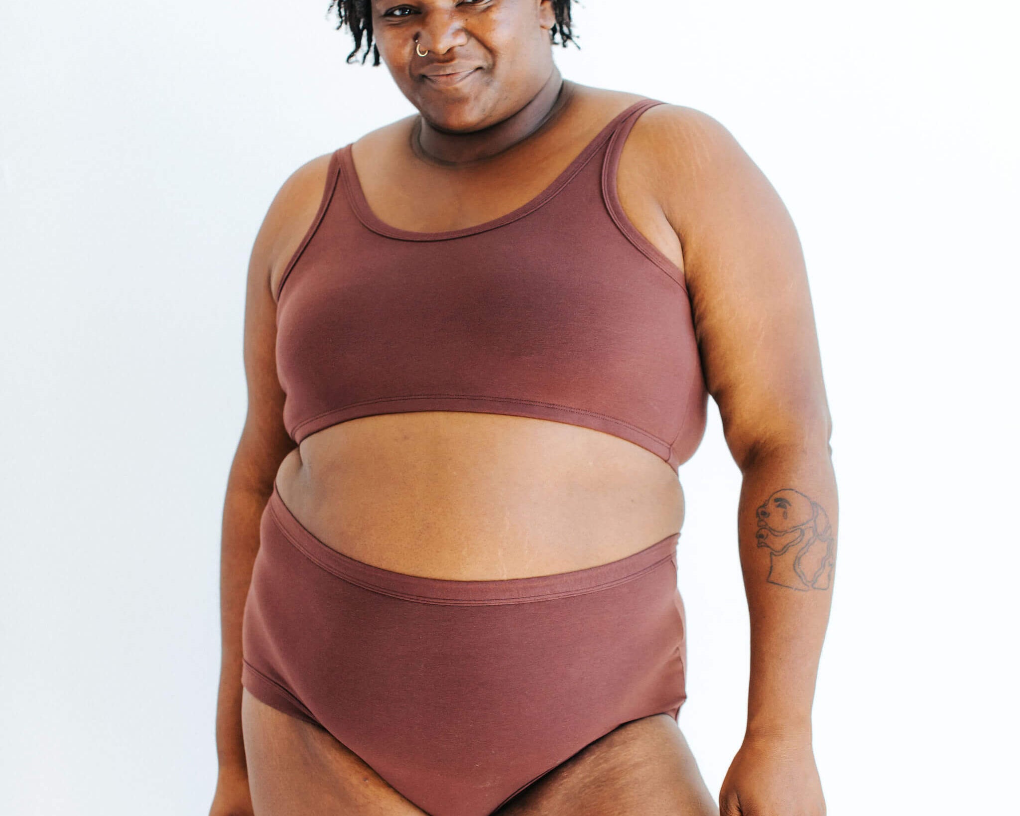 Model wearing Thunderpants Original style underwear and a Longline Bra in Chestnut - a dark brown color.