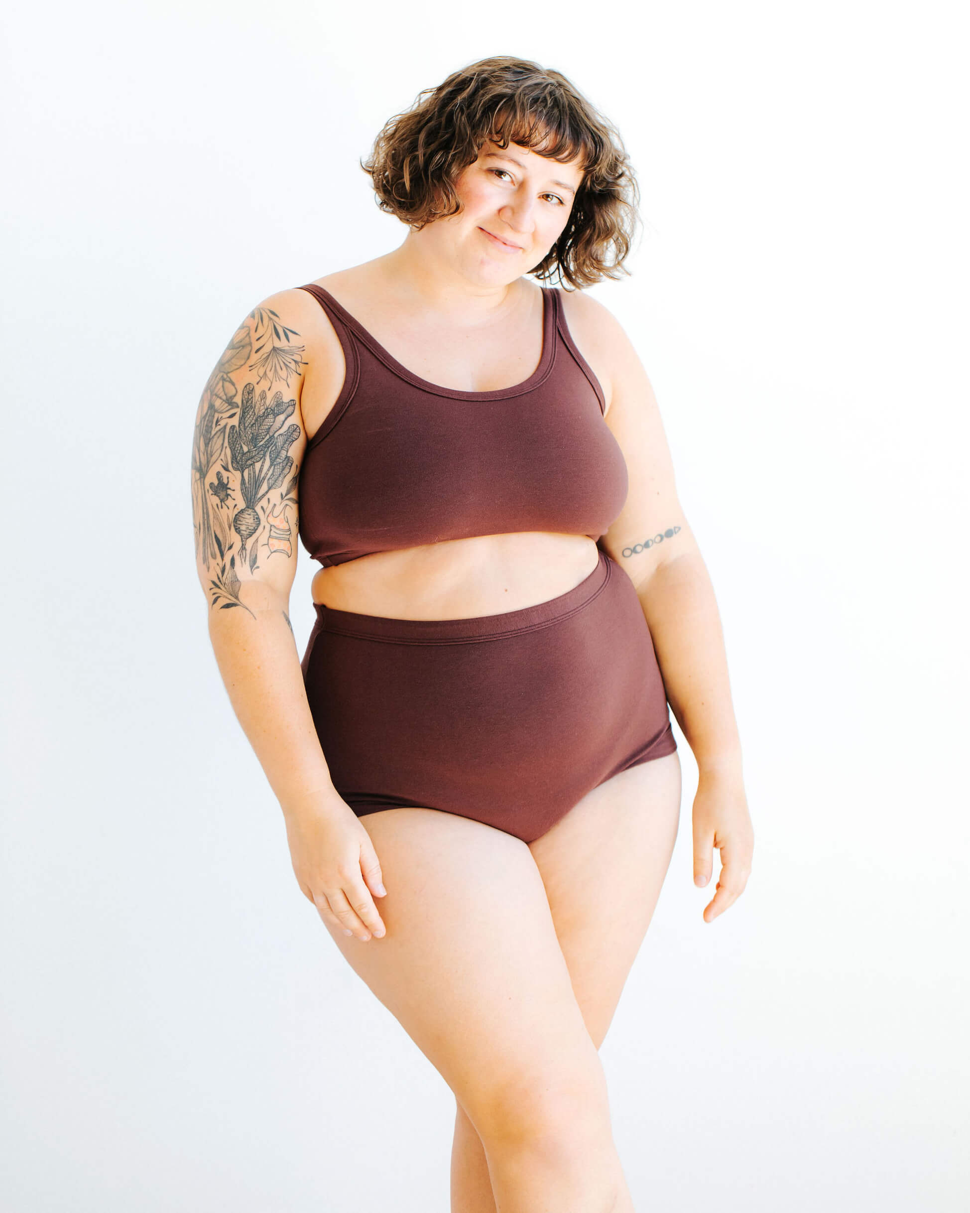 Model wearing Thunderpants Sky Rise style underwear and Longline Bra in Chestnut - a dark brown color.