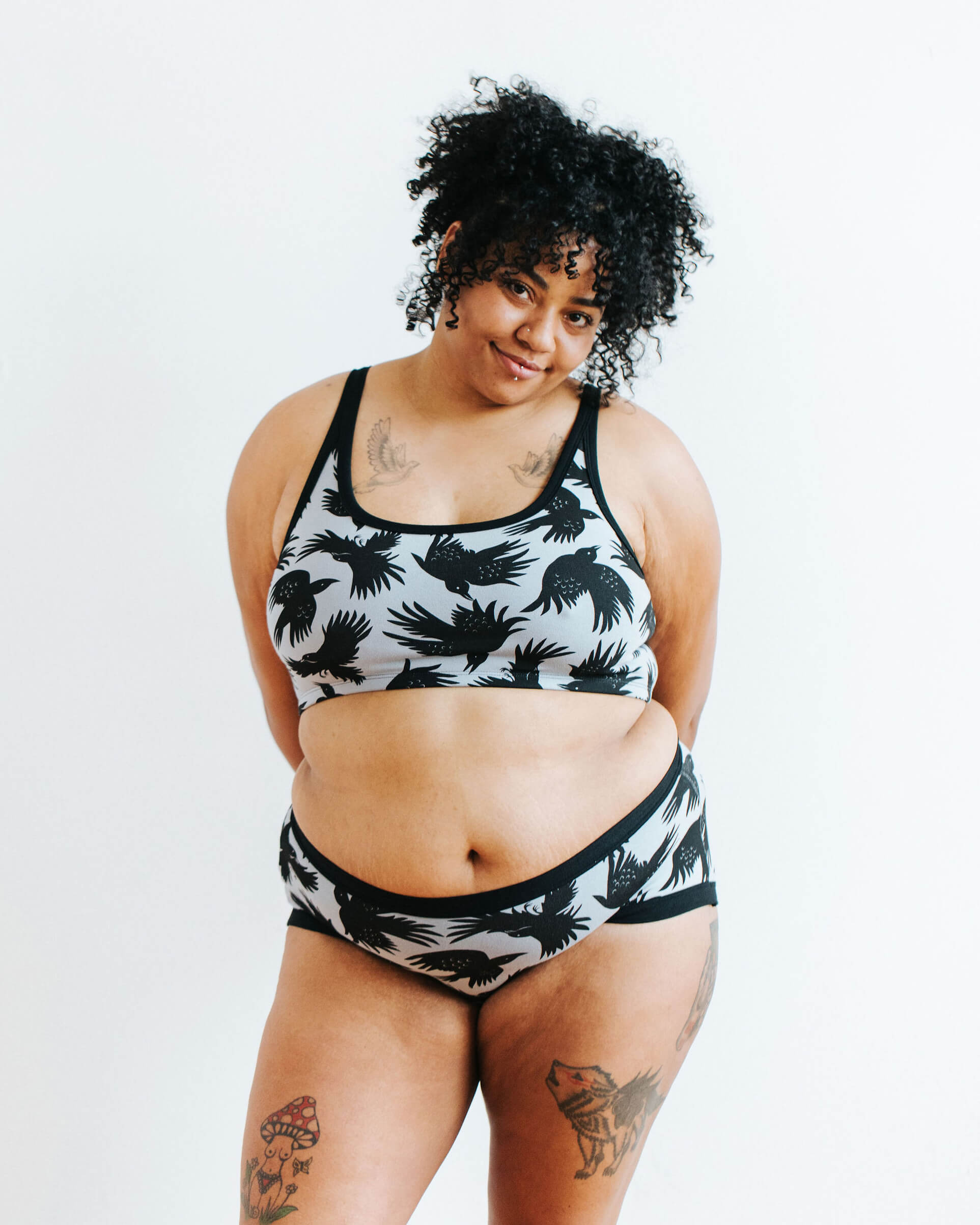 Model wearing Thunderpants Hipster style underwear and Longline Bra in So it Crows - black crows on grey. 