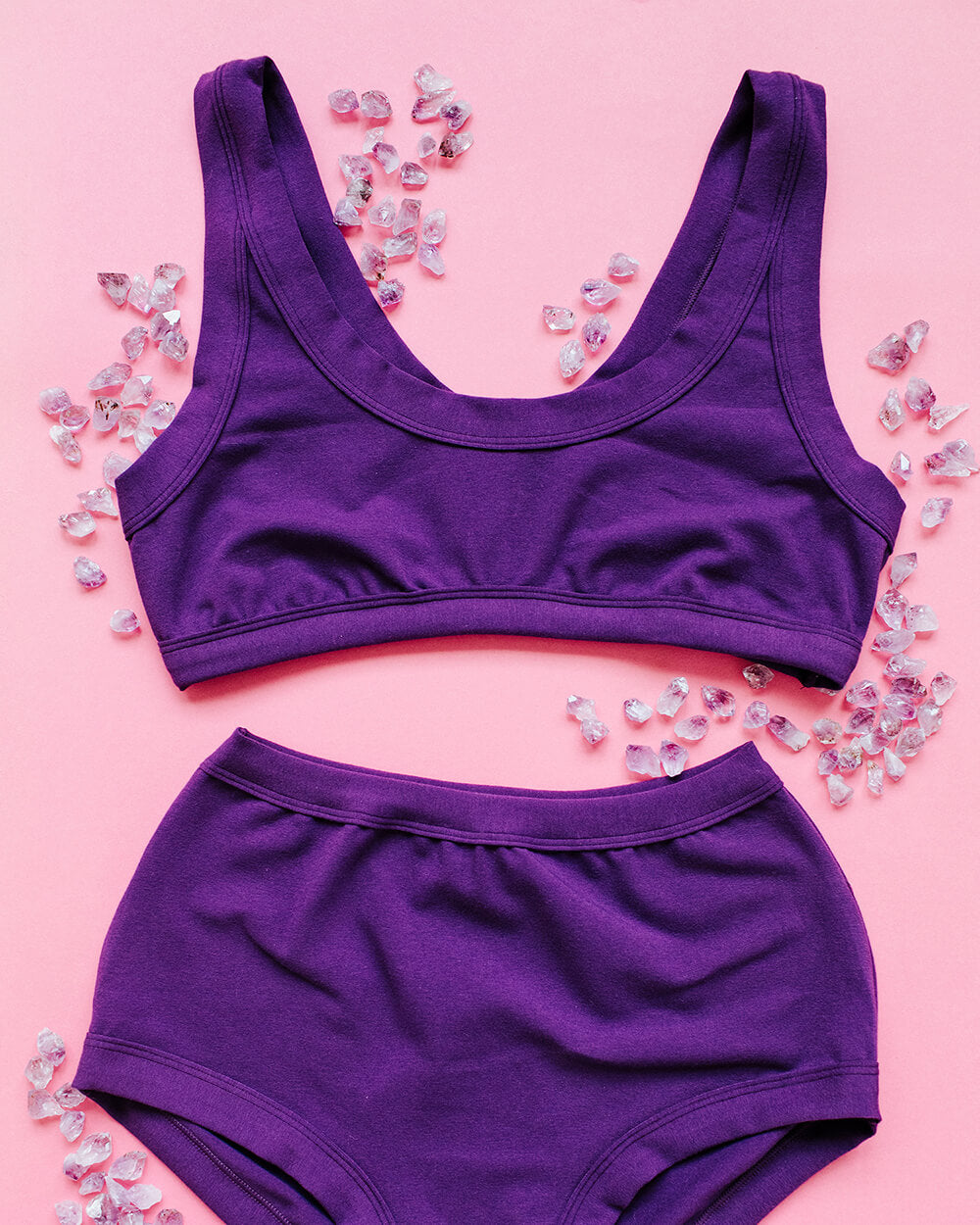 Flat lay of Thunderpants Bralette and Original style underwear in Amethyst color.