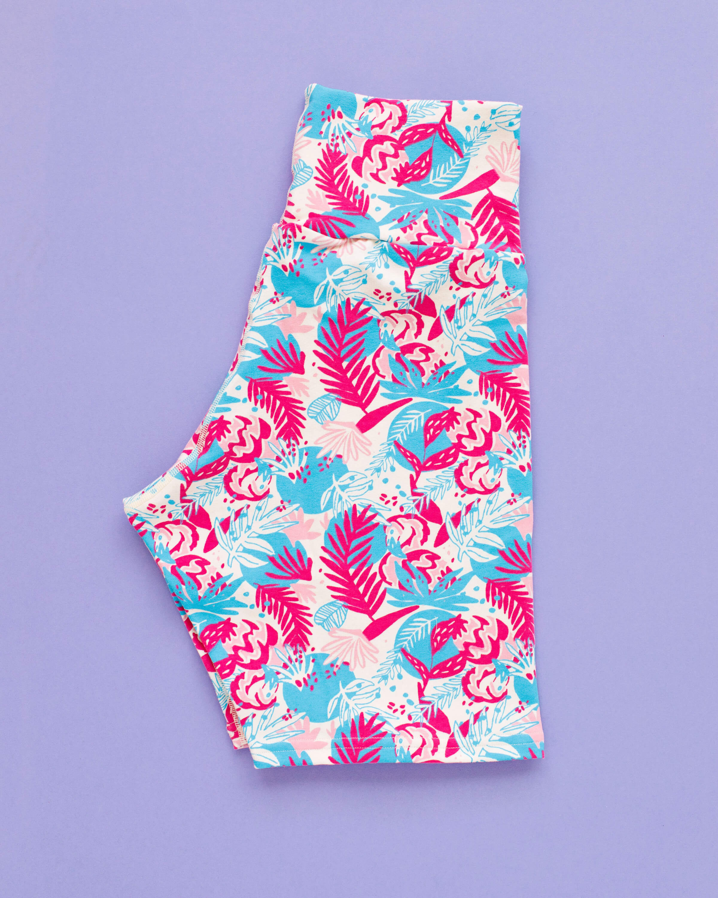 Flat lay of Thunderpants Bike Shorts in Finding Flamingo print.