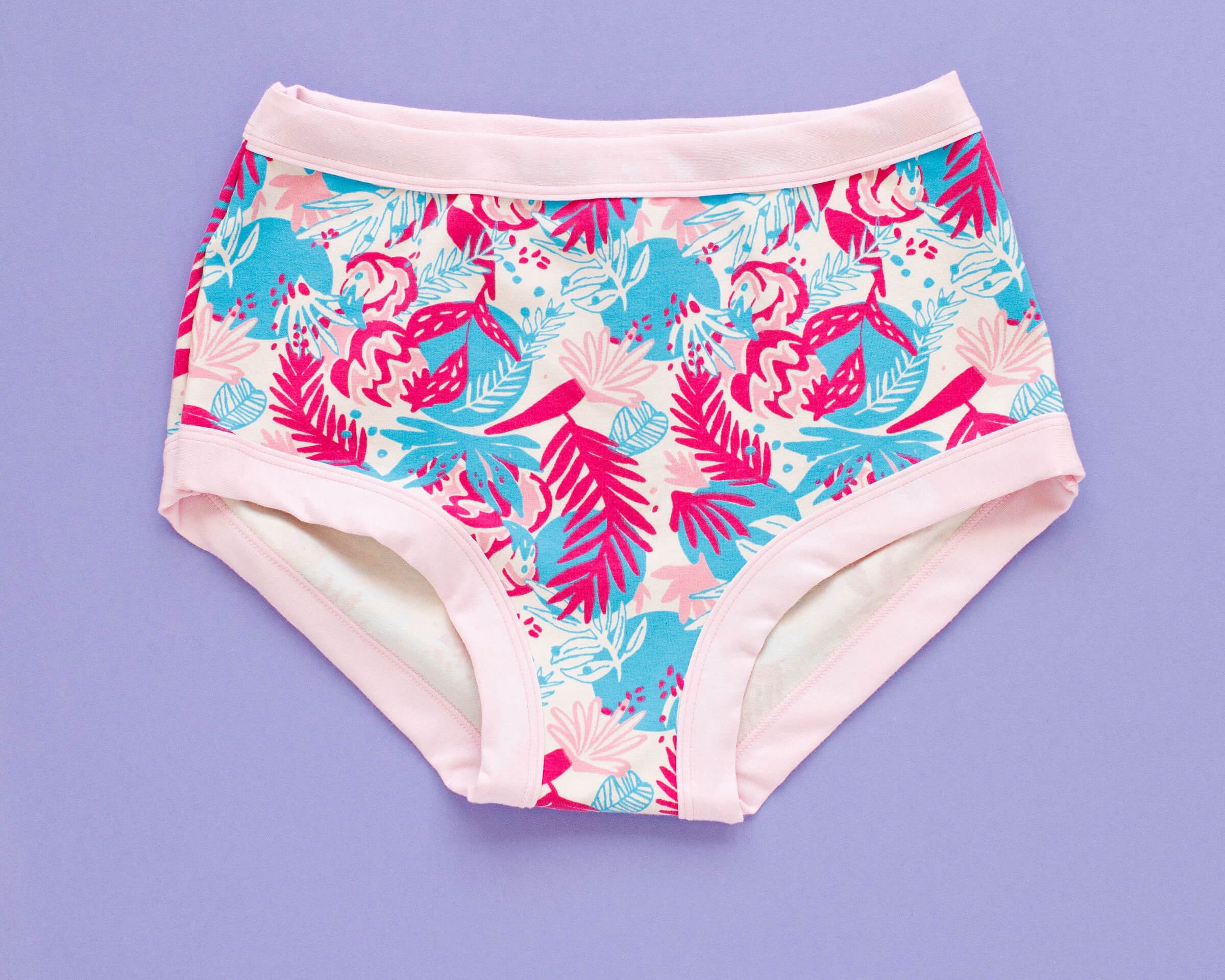 Flat lay of Thunderpants Original style underwear in Flamingo Fumble - Finding Flamingo with light pink binding.