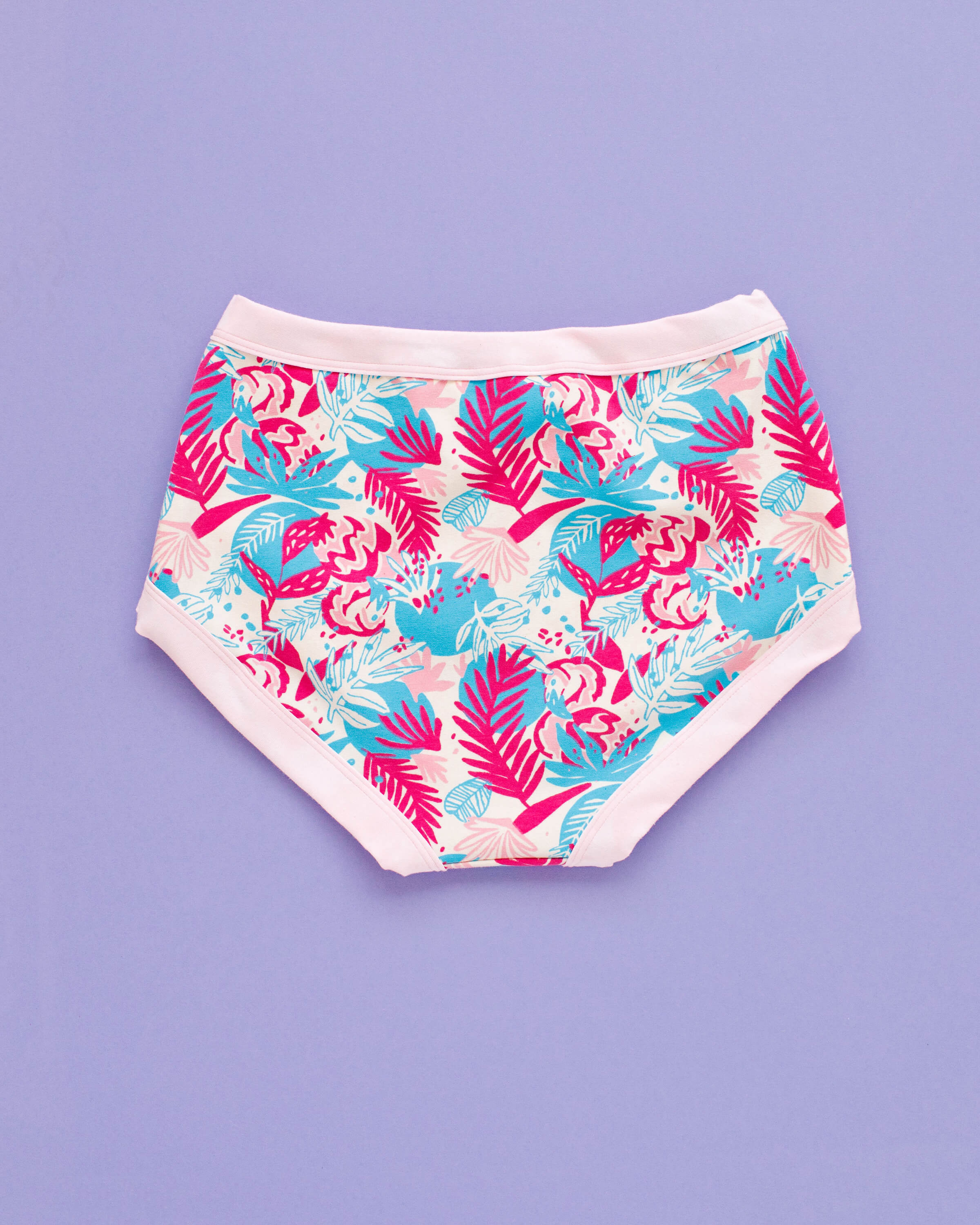 Flat lay of Thunderpants Original style underwear in Flamingo Fumble - Finding Flamingo with light pink binding.