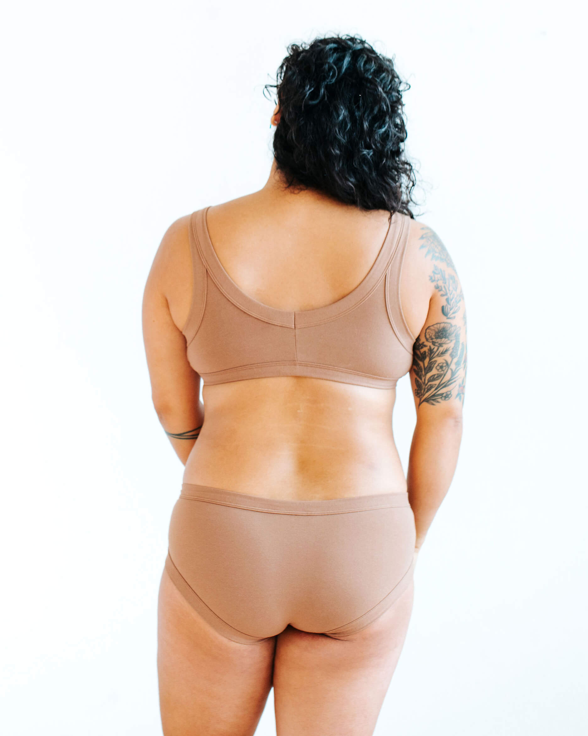 Model wearing Thunderpants Hipster style underwear and Bralette in Hazelnut color.