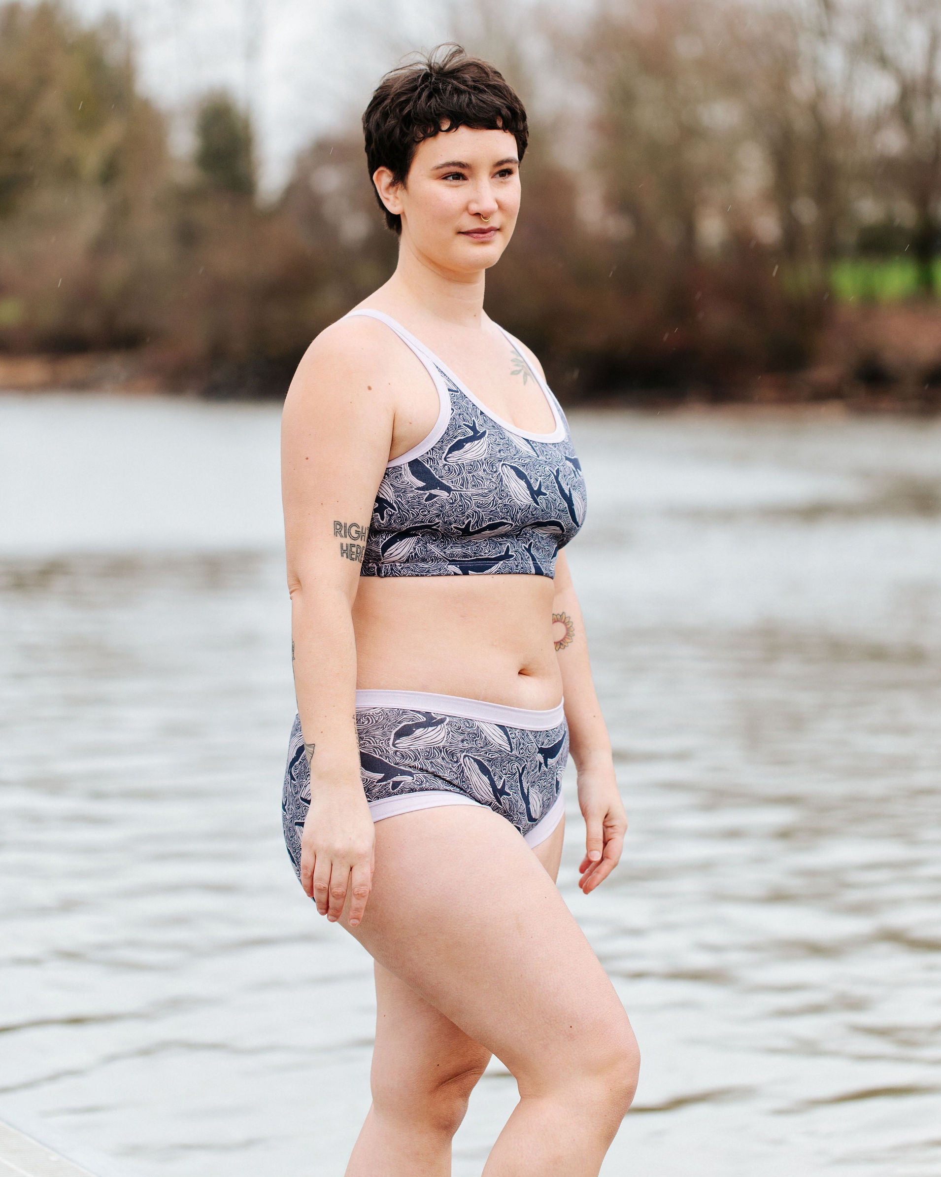 Model wearing Thunderpants Hipster style underwear and Longline Bra in Whale, Whale, Whale print - indigo whales on lavender.