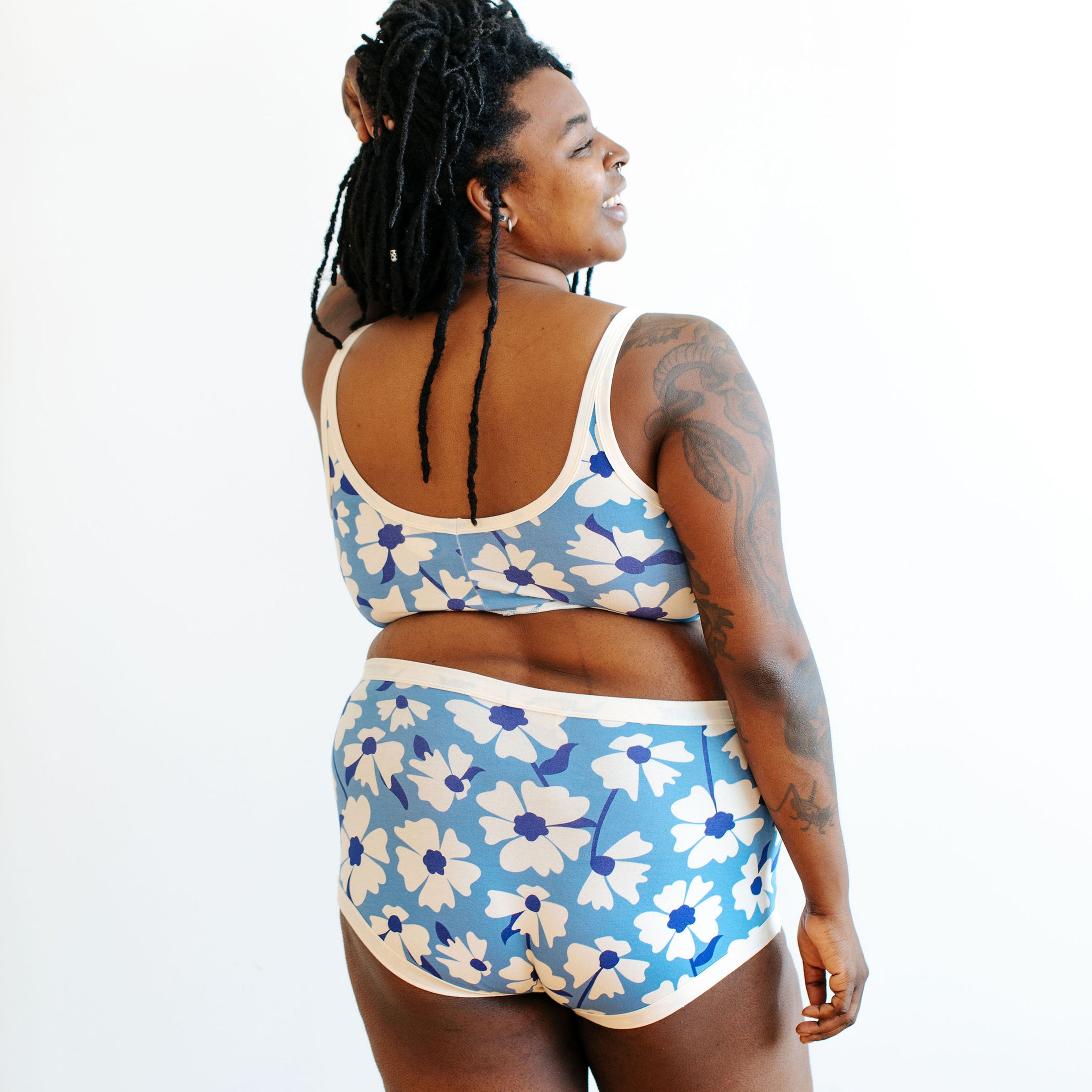 A model wearing an organic cotton Thunderpants bra and underwear set.