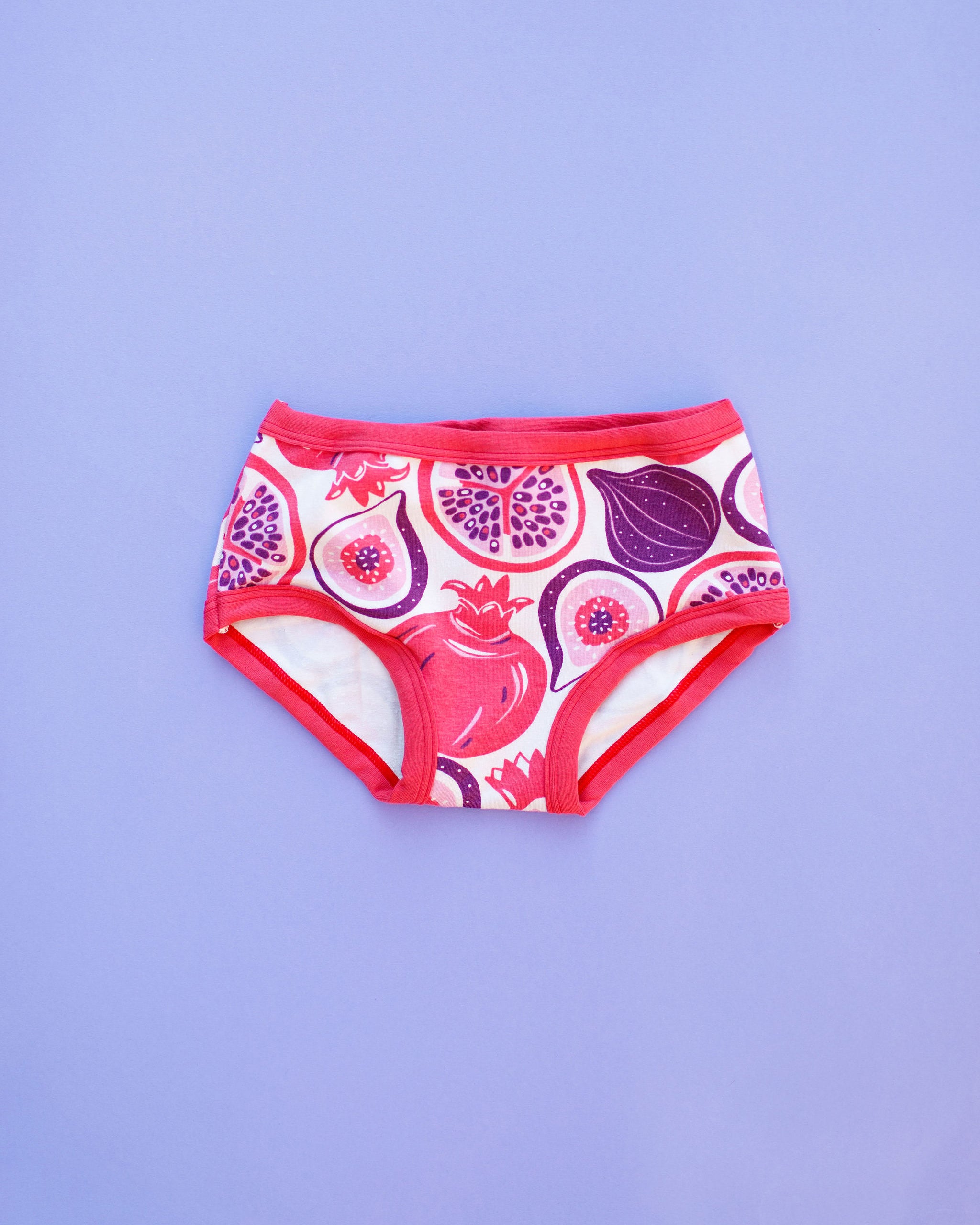 Flat lay of Thunderpants Kids style underwear in Two Fruits print. 