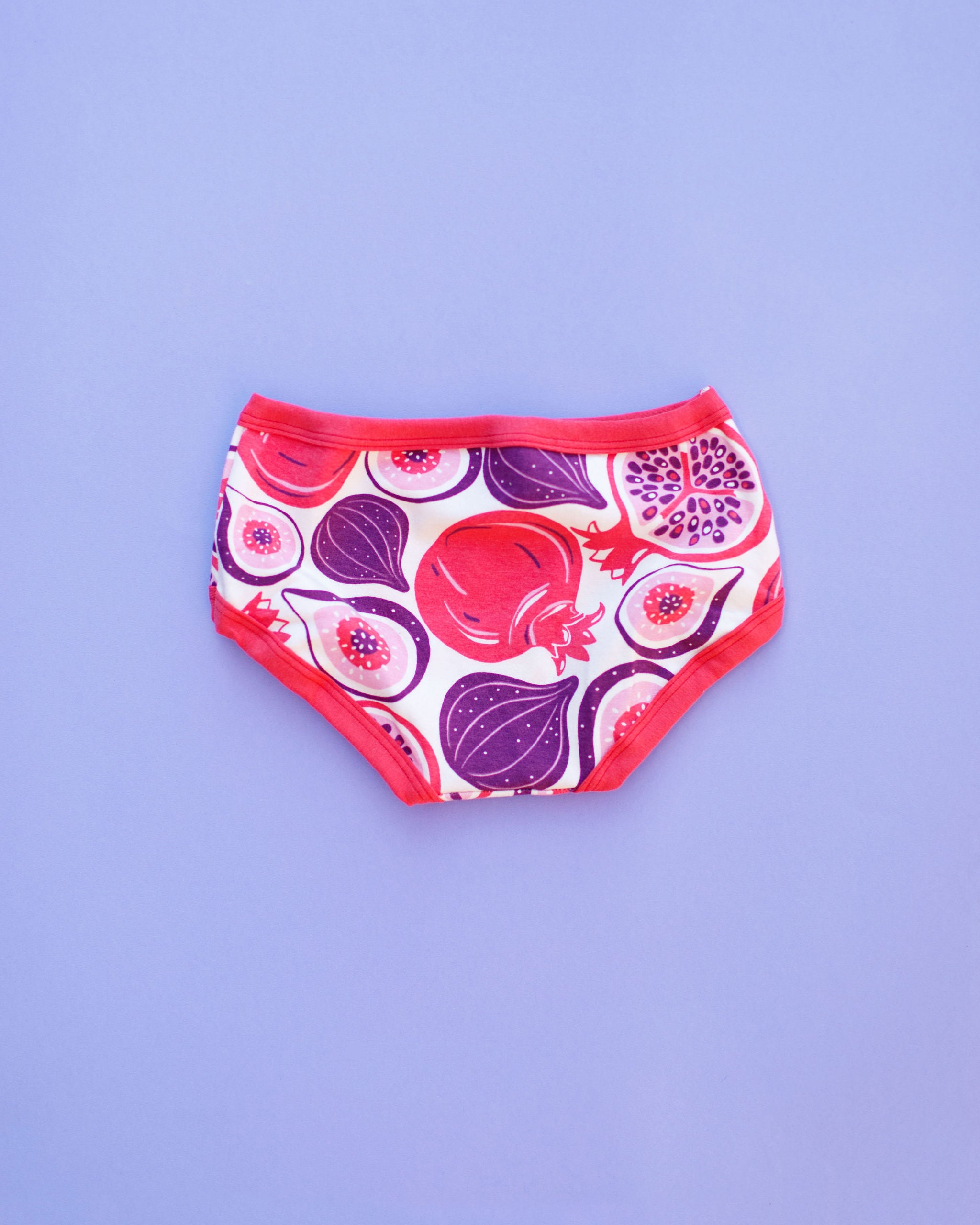 Flat lay of Thunderpants Kids style underwear in Two Fruits print. 