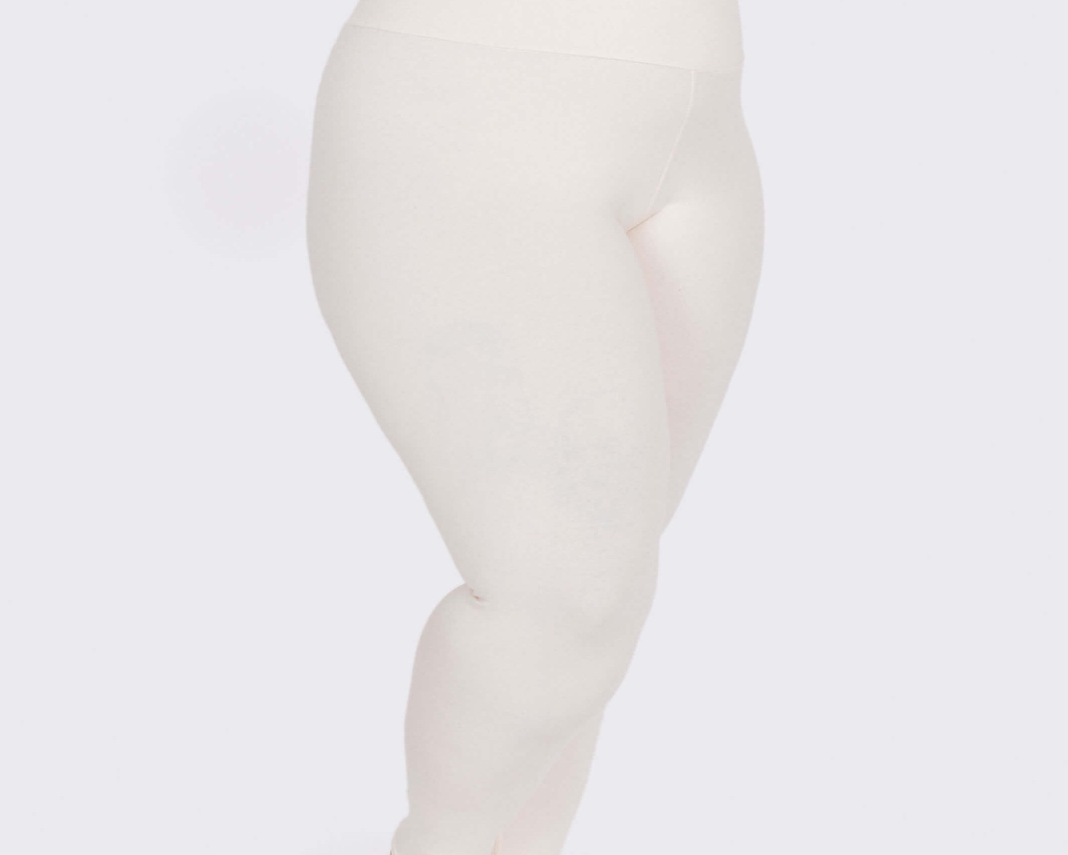 Fit photo from the front of Thunderpants organic cotton Leggings in off-white on a model.