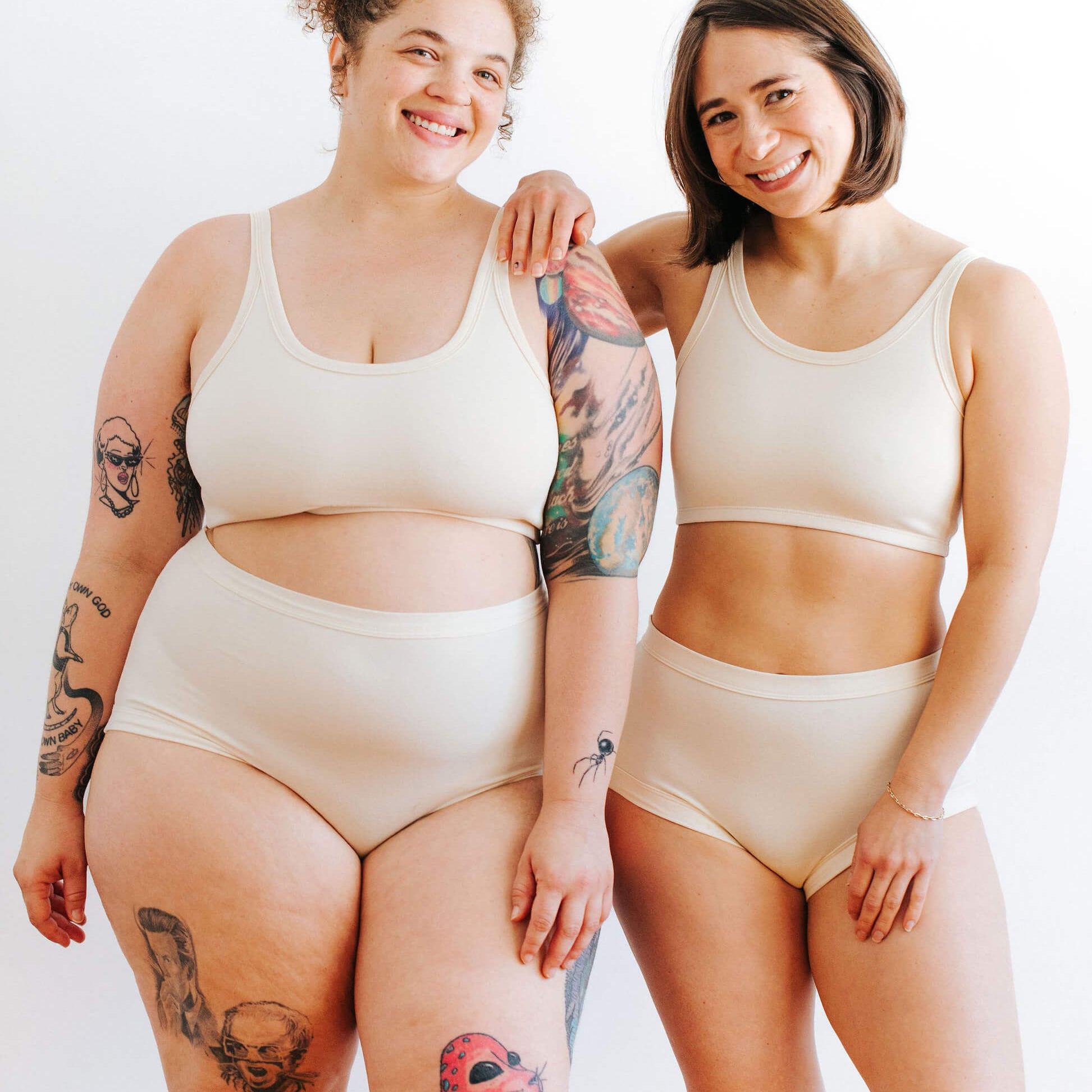 Fit photo from the front of Thunderpants organic cotton Longline Bra and Original style underwear on two models.