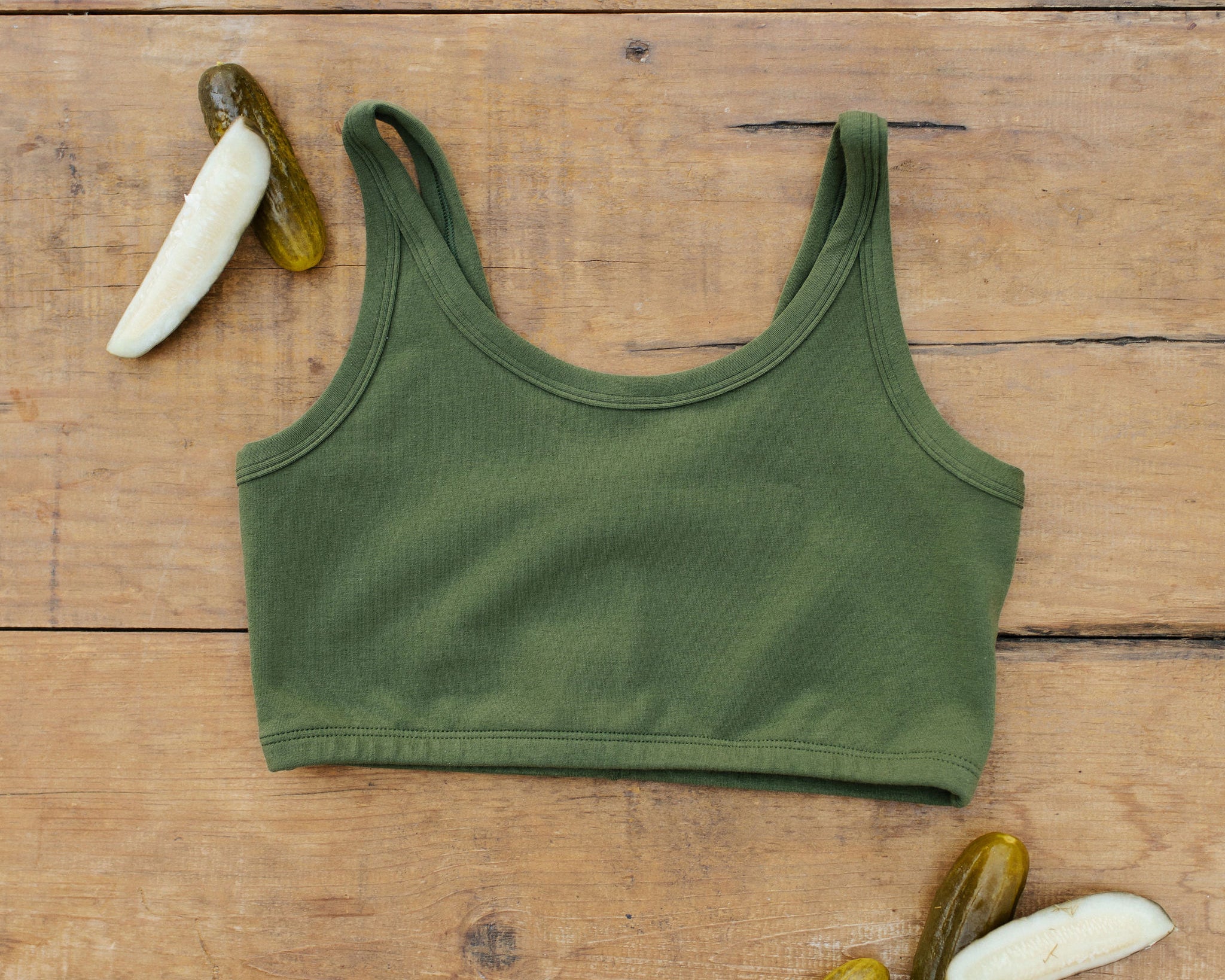 Flat lay of Thunderpants Longline Bra in Pickled Green.