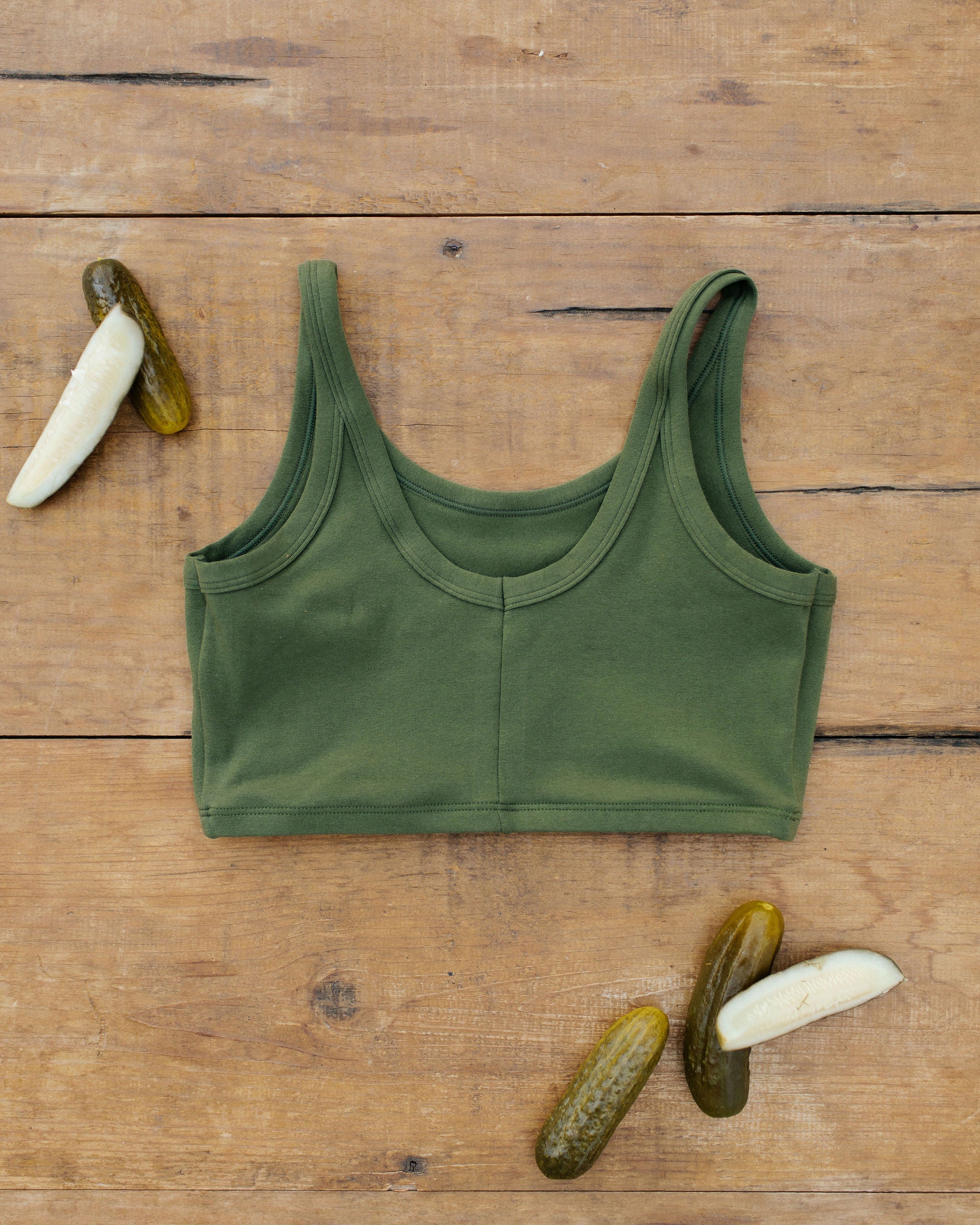 Flat lay of Thunderpants Longline Bra in Pickled Green.