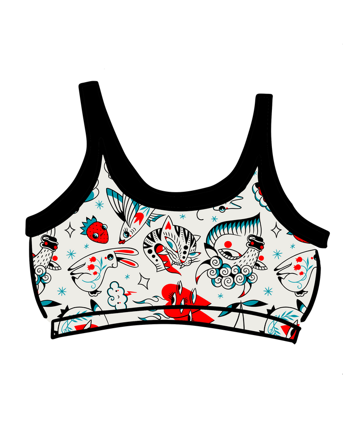 Drawing of Thunderpants Longline Bra in Inked Up - a tattoo pattern with black, red, and blue. 