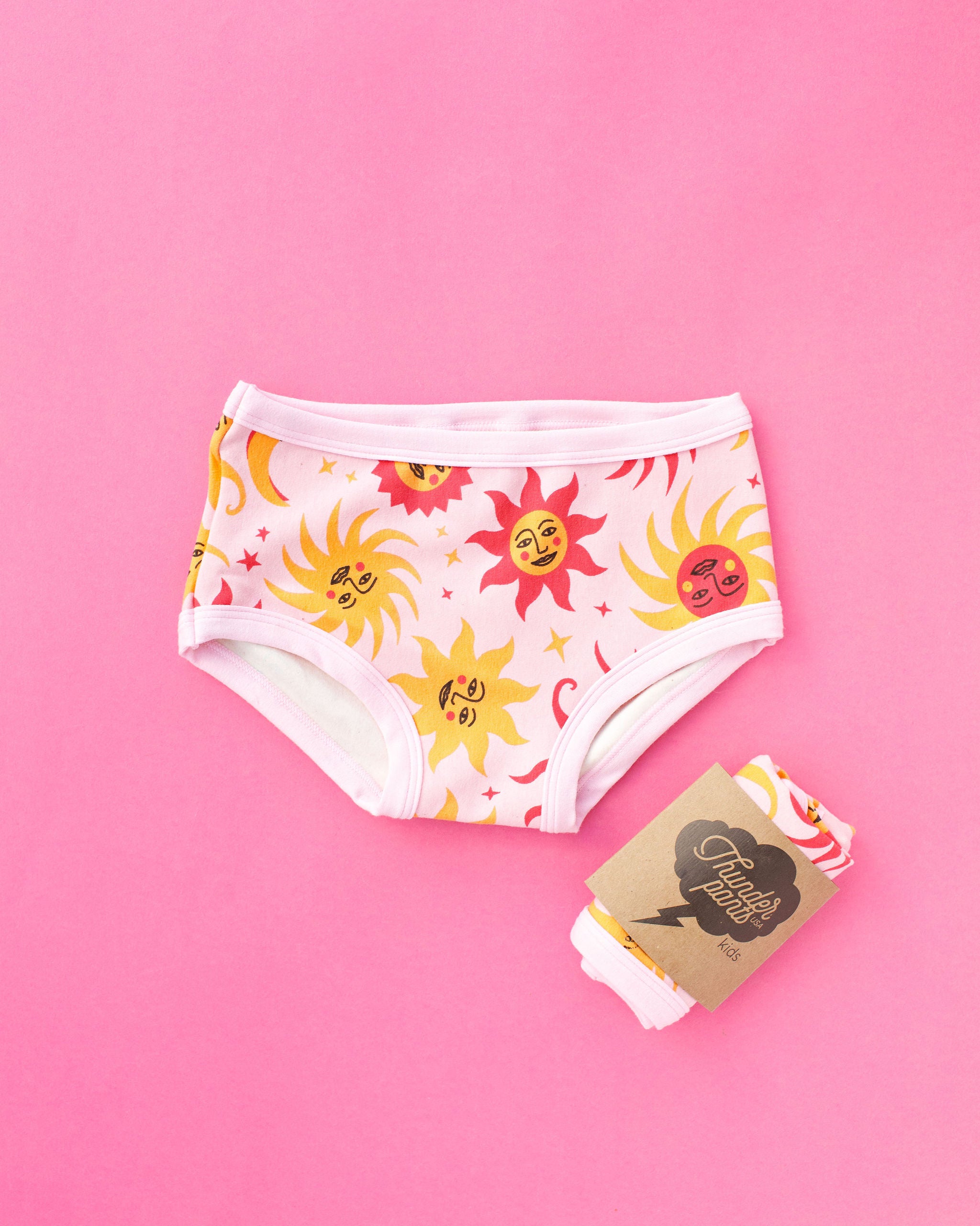 Flat lay of Thunderpants Kid's Original style underwear in Luna y Sol print.