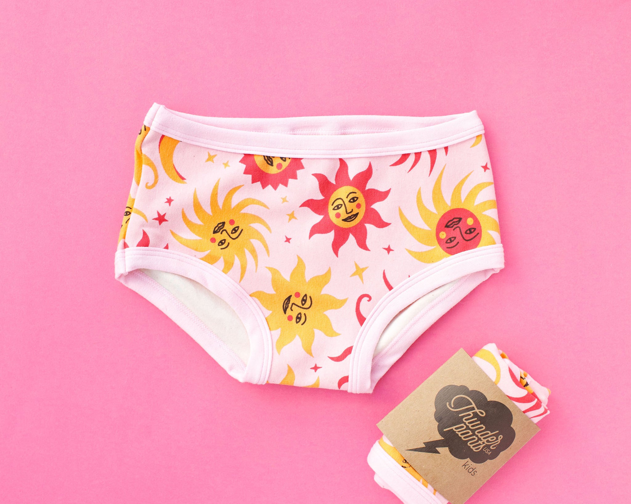 Flat lay of Thunderpants Kid's Original style underwear in Luna y Sol print.