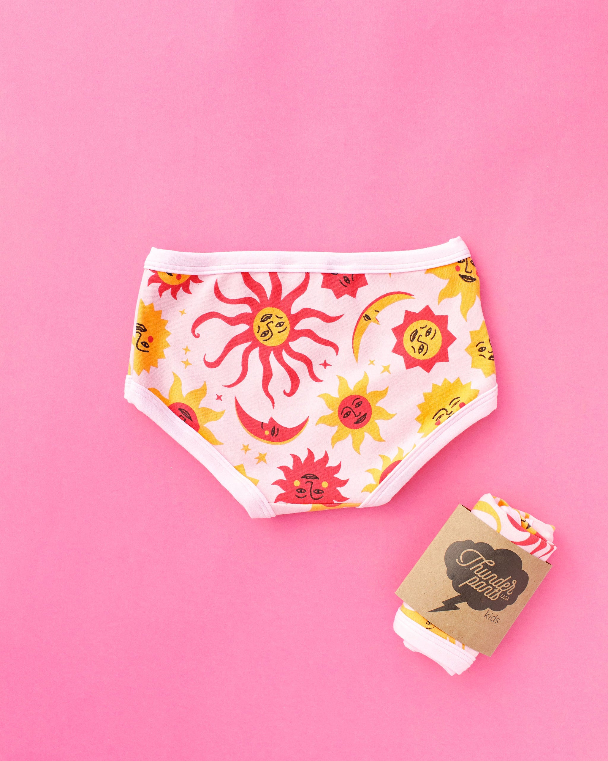 Flat lay of Thunderpants Kid's Original style underwear in Luna y Sol print.