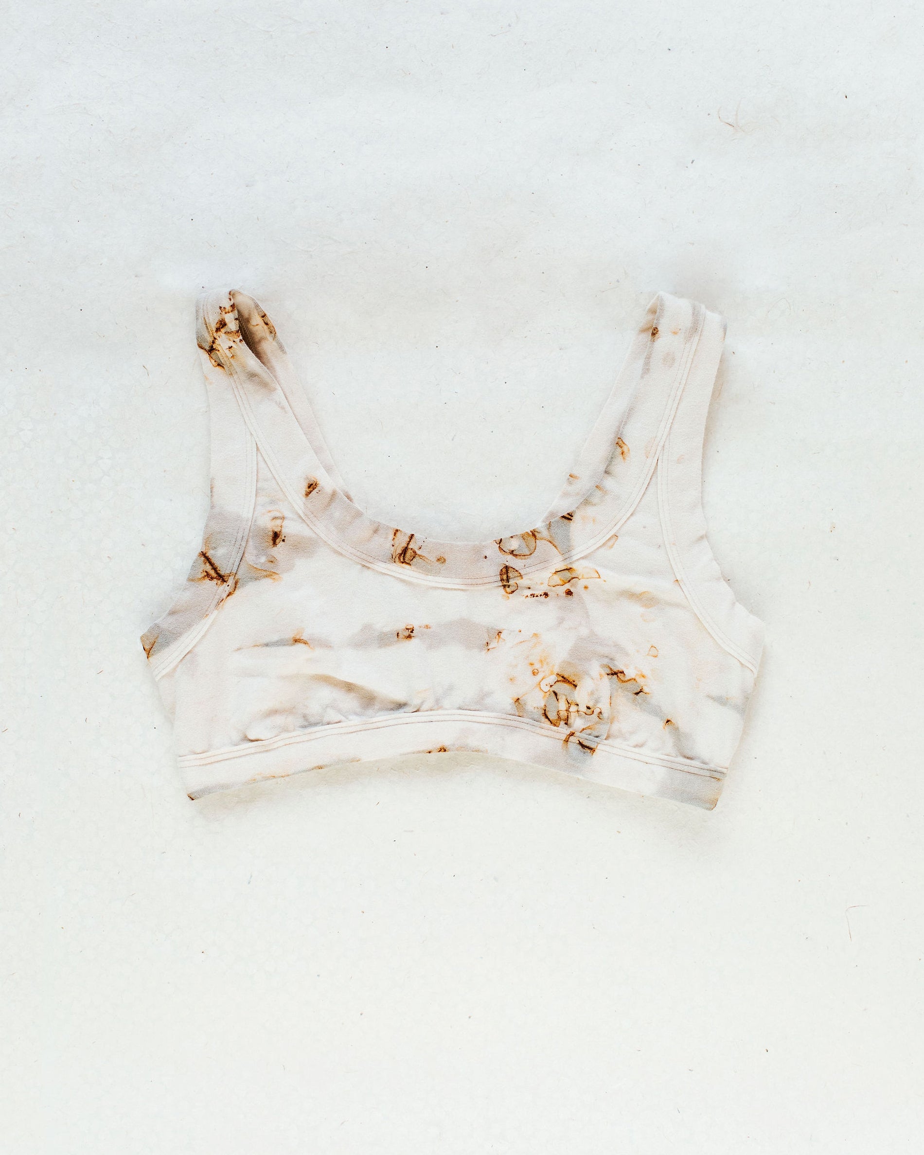 Flat lay photo of Thunderpants Bralette in Mineral Rust Hand Dye.