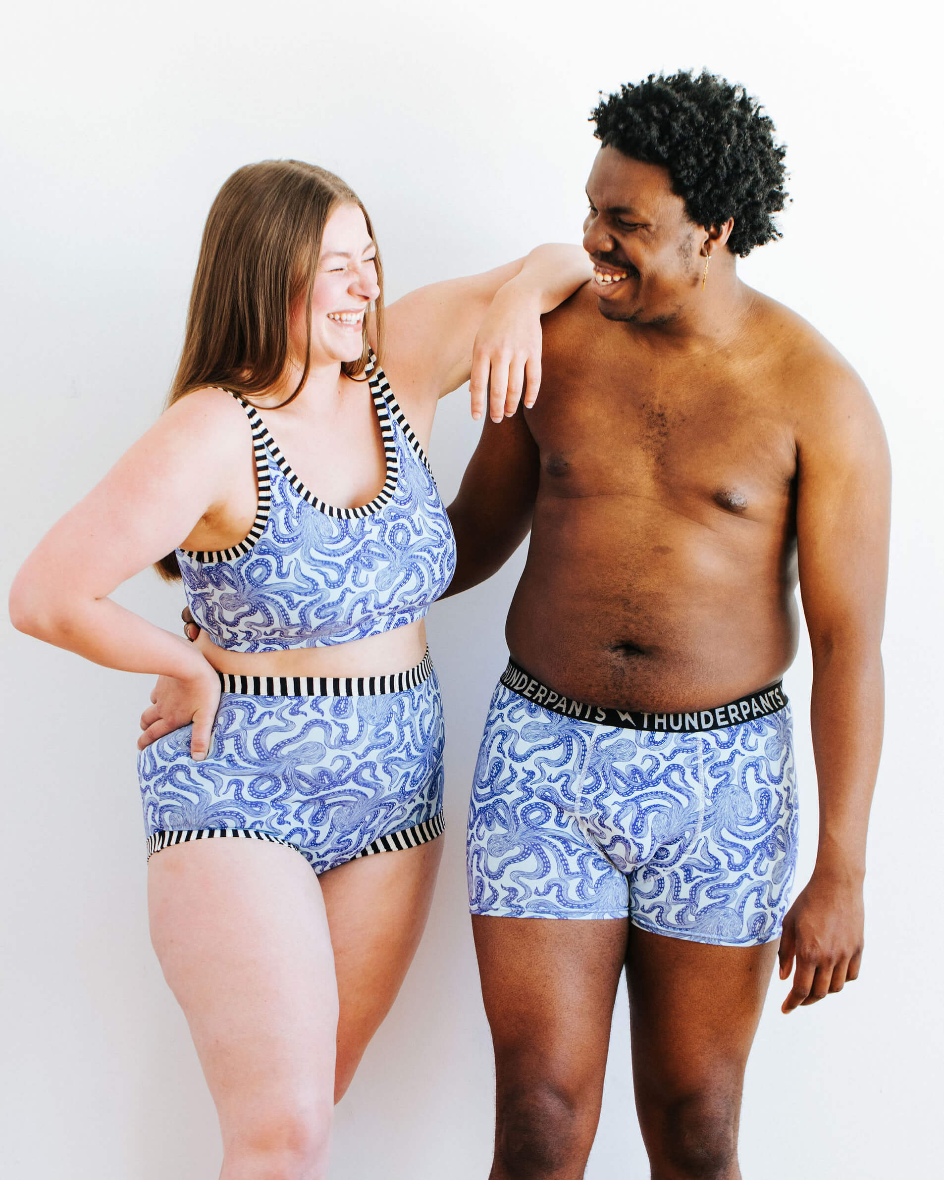 Two models wearing various Thunderpants styles in Octopants print.