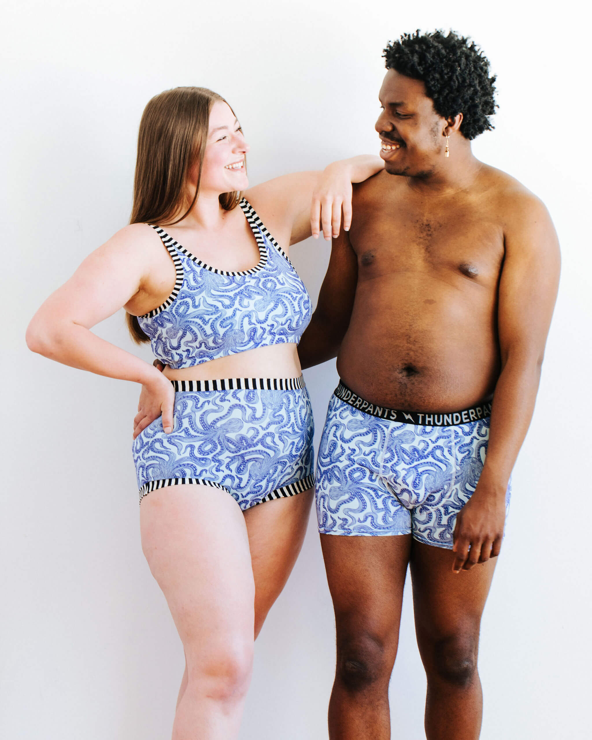 Two models wearing various Thunderpants styles in Octopants print.