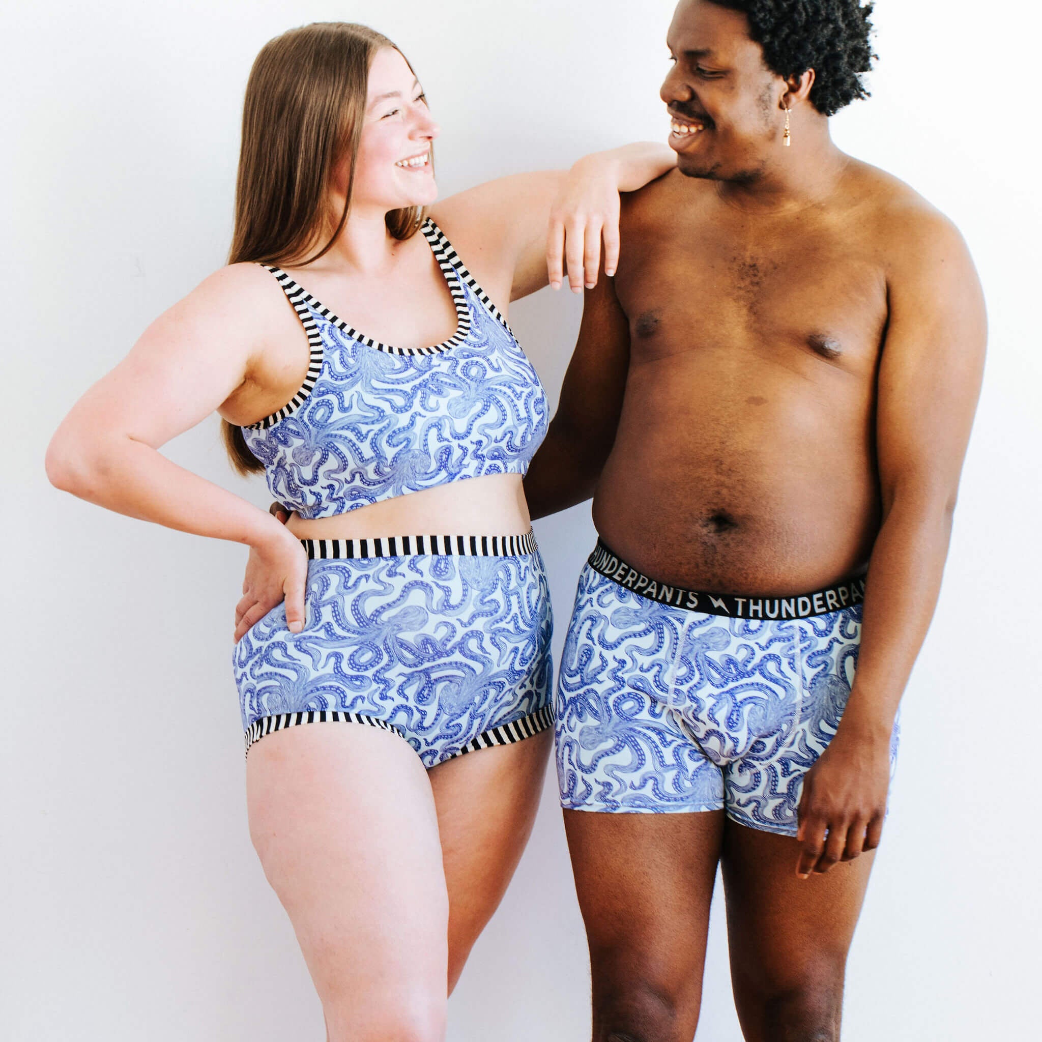 Two models wearing various Thunderpants styles in Octopants print.