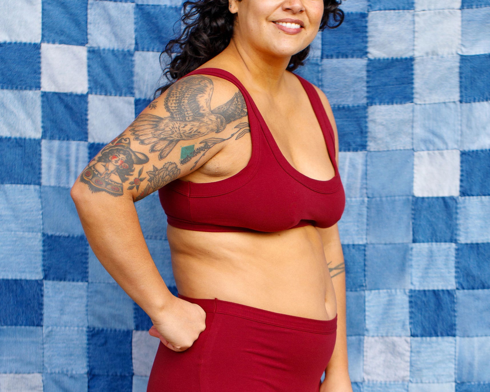 Model wearing Thunderpants Original style underwear and Bralette in Cabern-YAY - a deep wine red color.