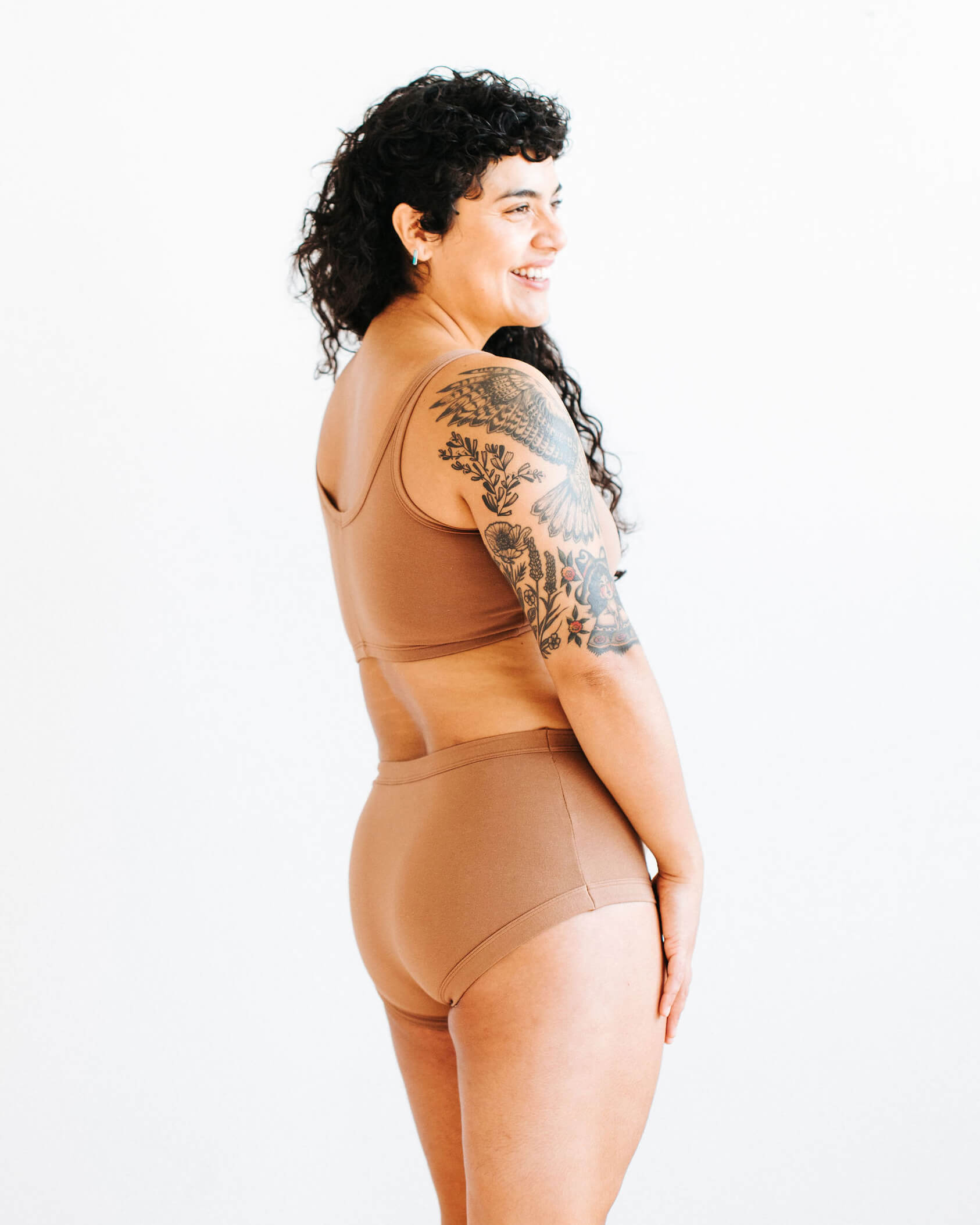 Model wearing Thunderpants Original style underwear and Longline Bra in Hazelnut color.