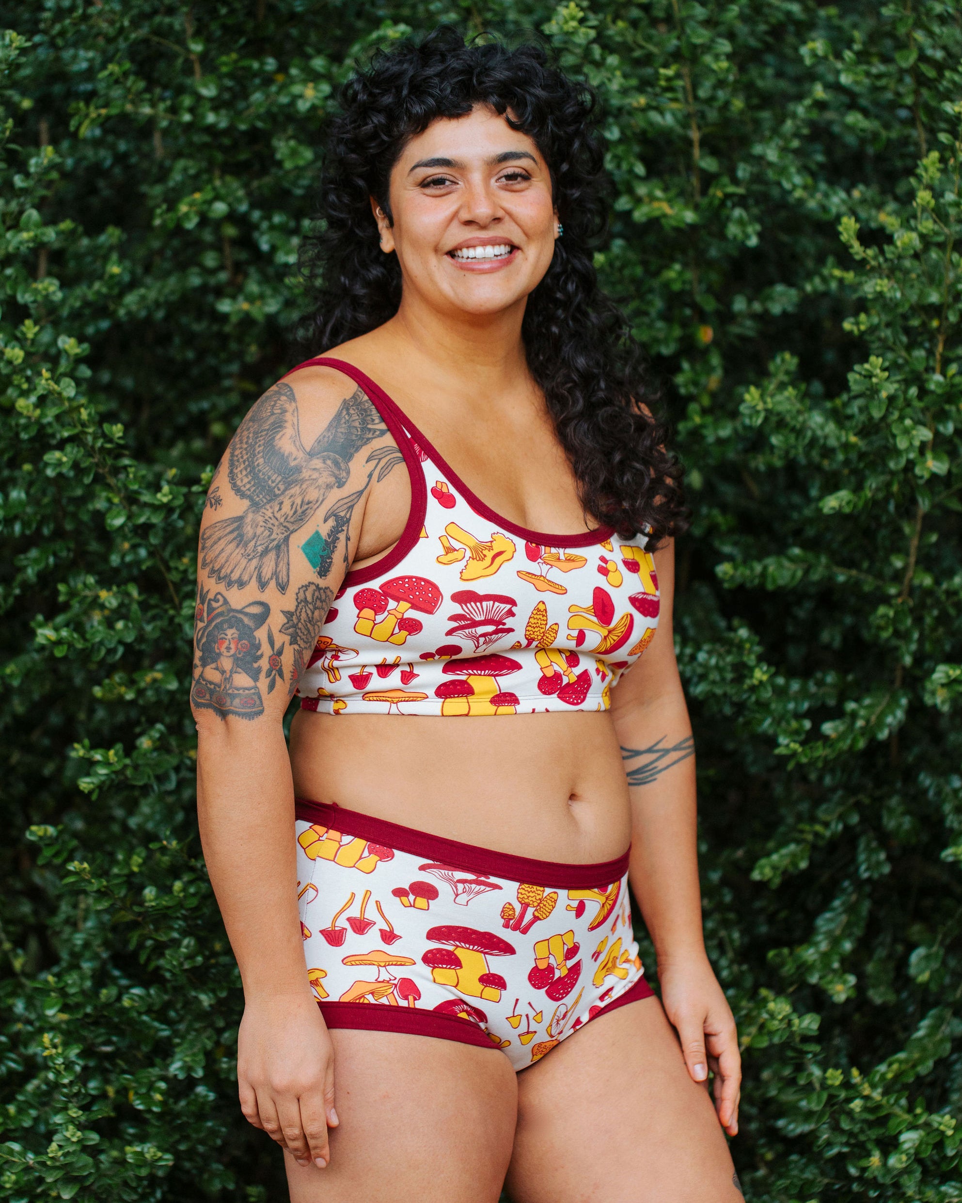 Model wearing Thunderpants Original style underwear  and Longline Bra in Whadda Fungi - red, orange, and yellow mushroom print.