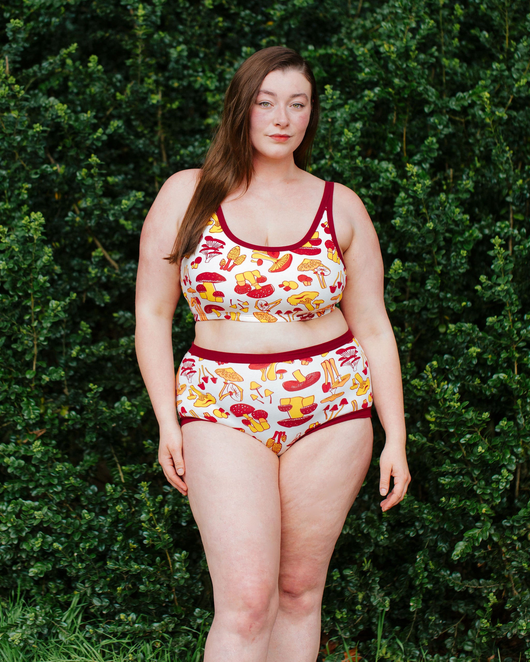 Model wearing Thunderpants Original style underwear  and Longline Bra in Whadda Fungi - red, orange, and yellow mushroom print.