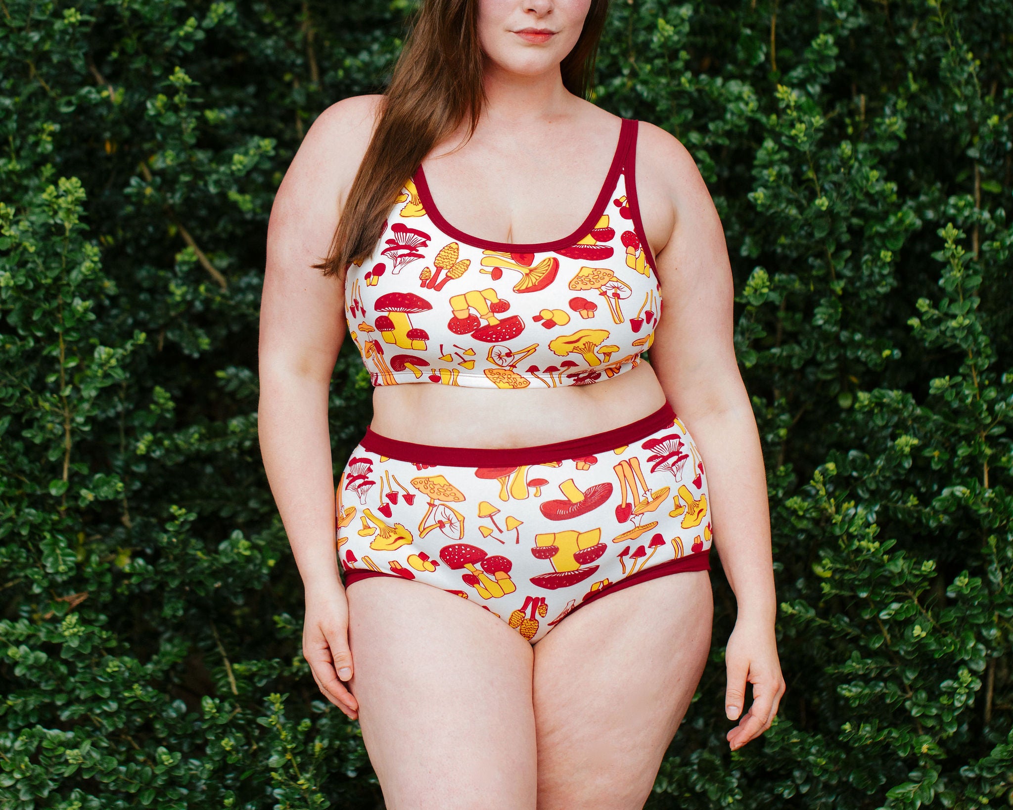 Model wearing Thunderpants Original style underwear  and Longline Bra in Whadda Fungi - red, orange, and yellow mushroom print.