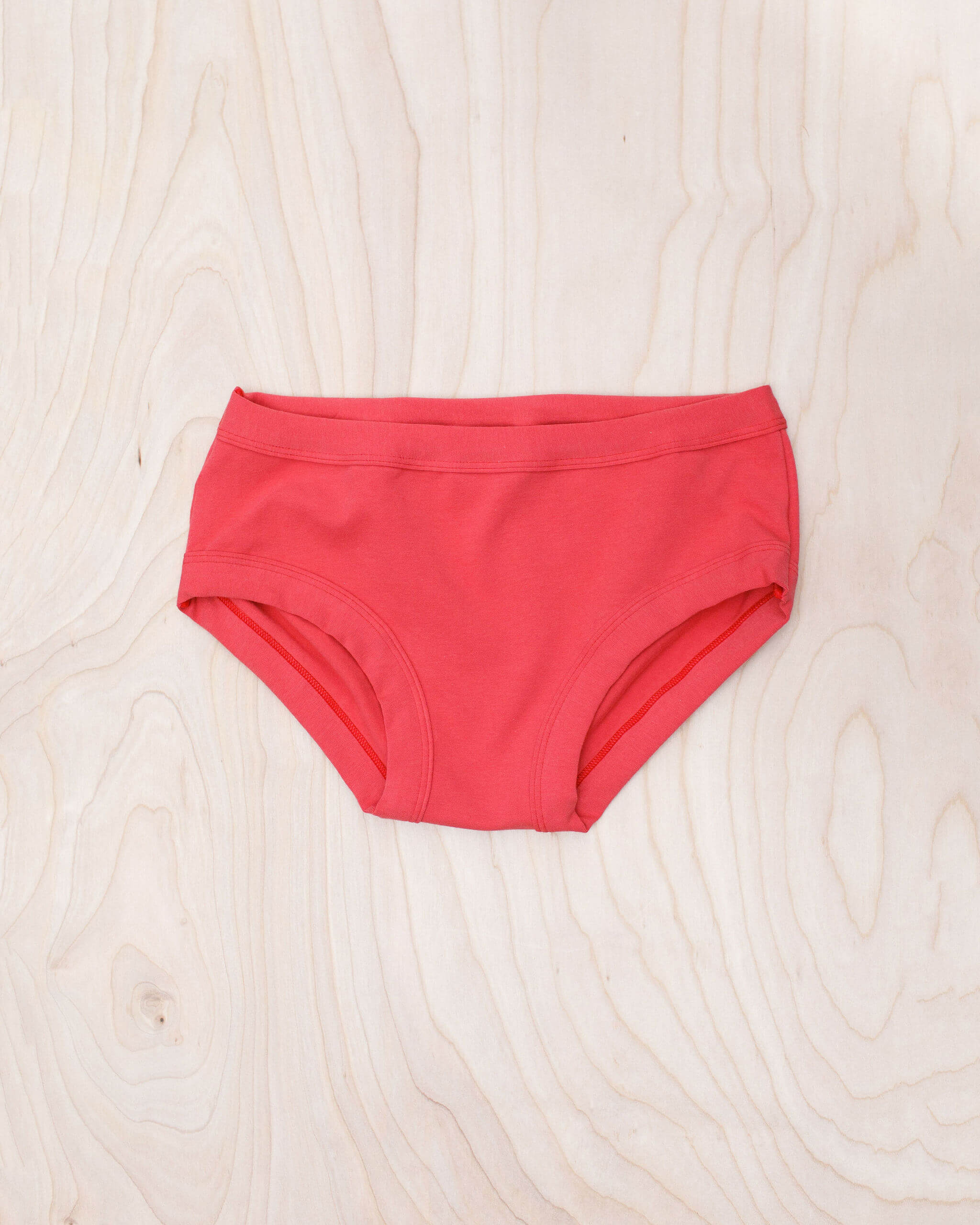 Flat lay of Thunderpants Hipster style underwear in Pomegranate Punch color.