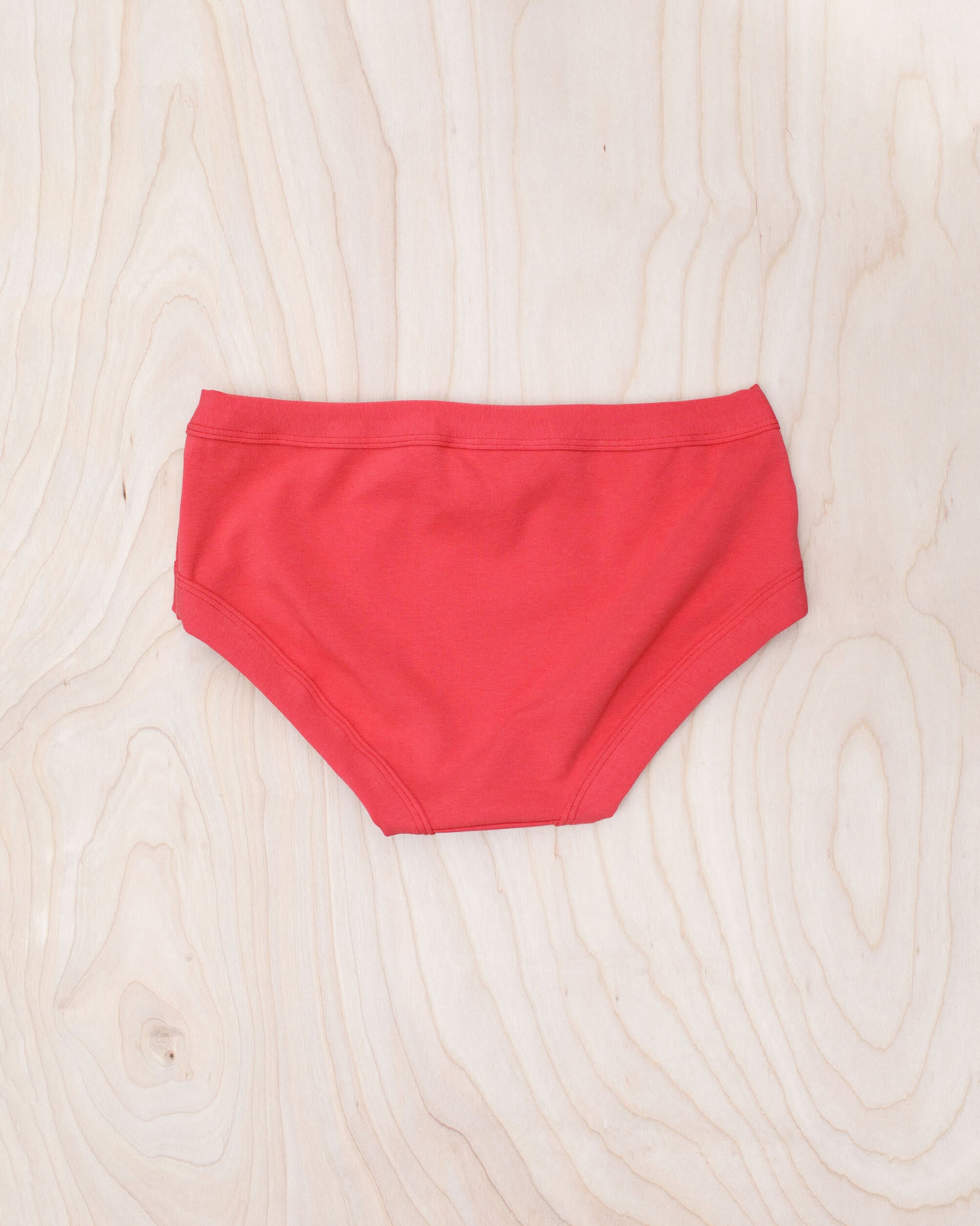 Flat lay of Thunderpants Hipster style underwear in Pomegranate Punch color.