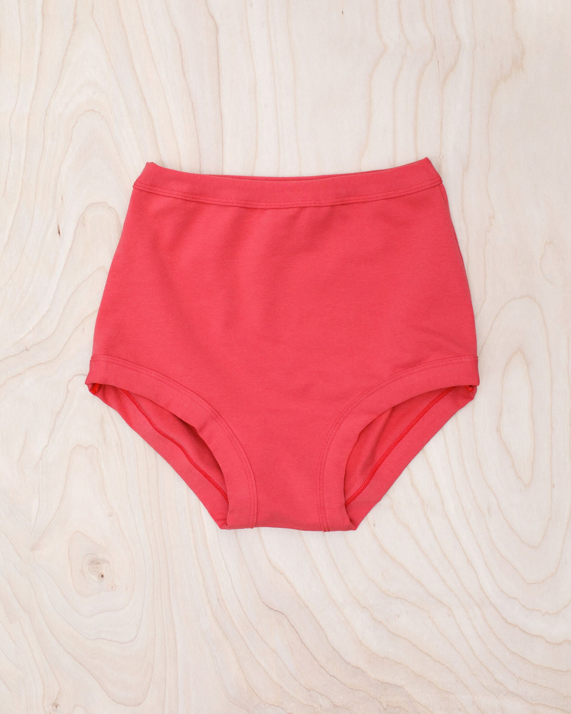 Flat lay of Thunderpants Sky Rise style underwear in Pomegranate Punch color.