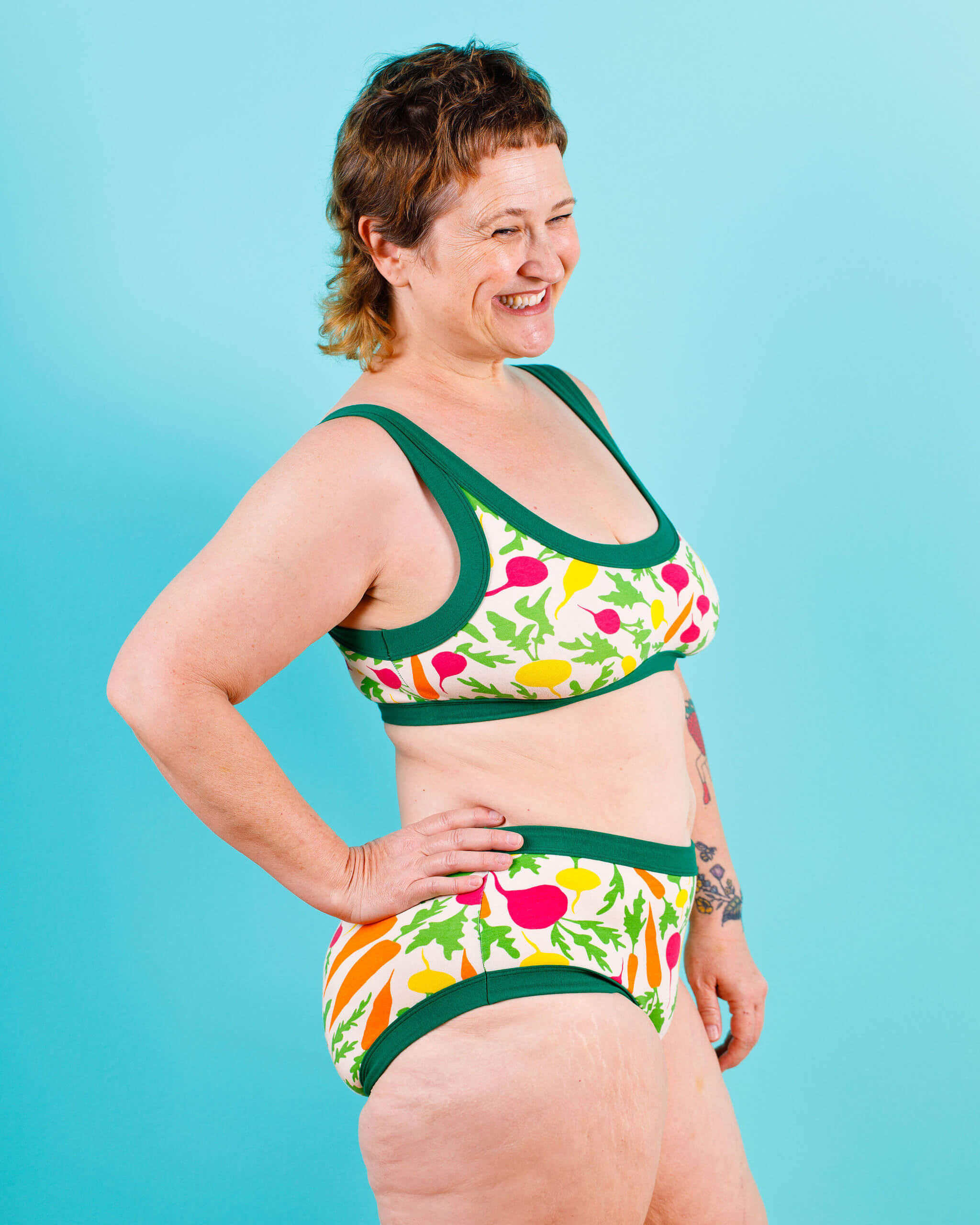 Model wearing Thunderpants Hipster style underwear and Bralette in Root Veggies print.