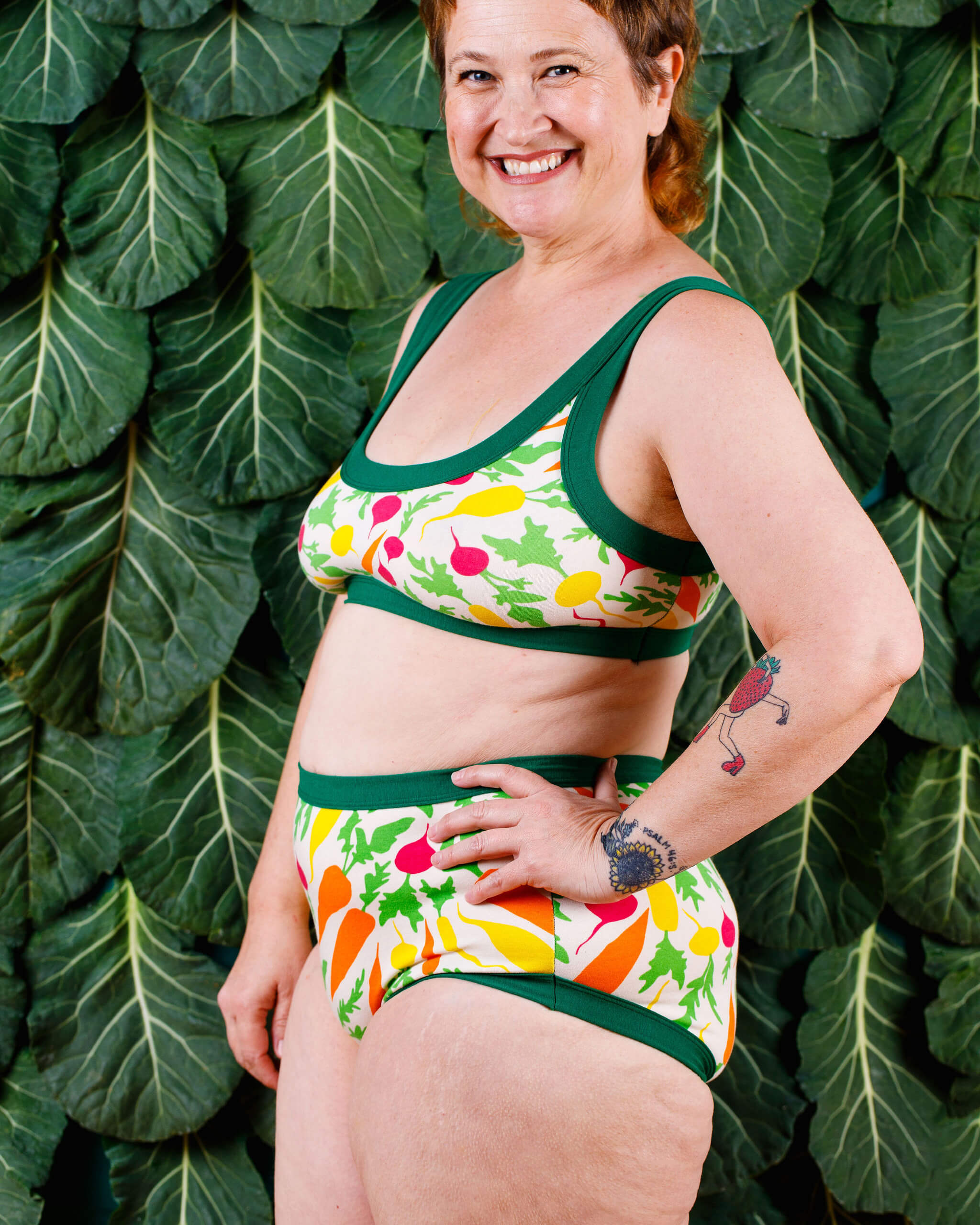 Model wearing a set of Thunderpants Original style underwear and Bralette in Root Veggies print.