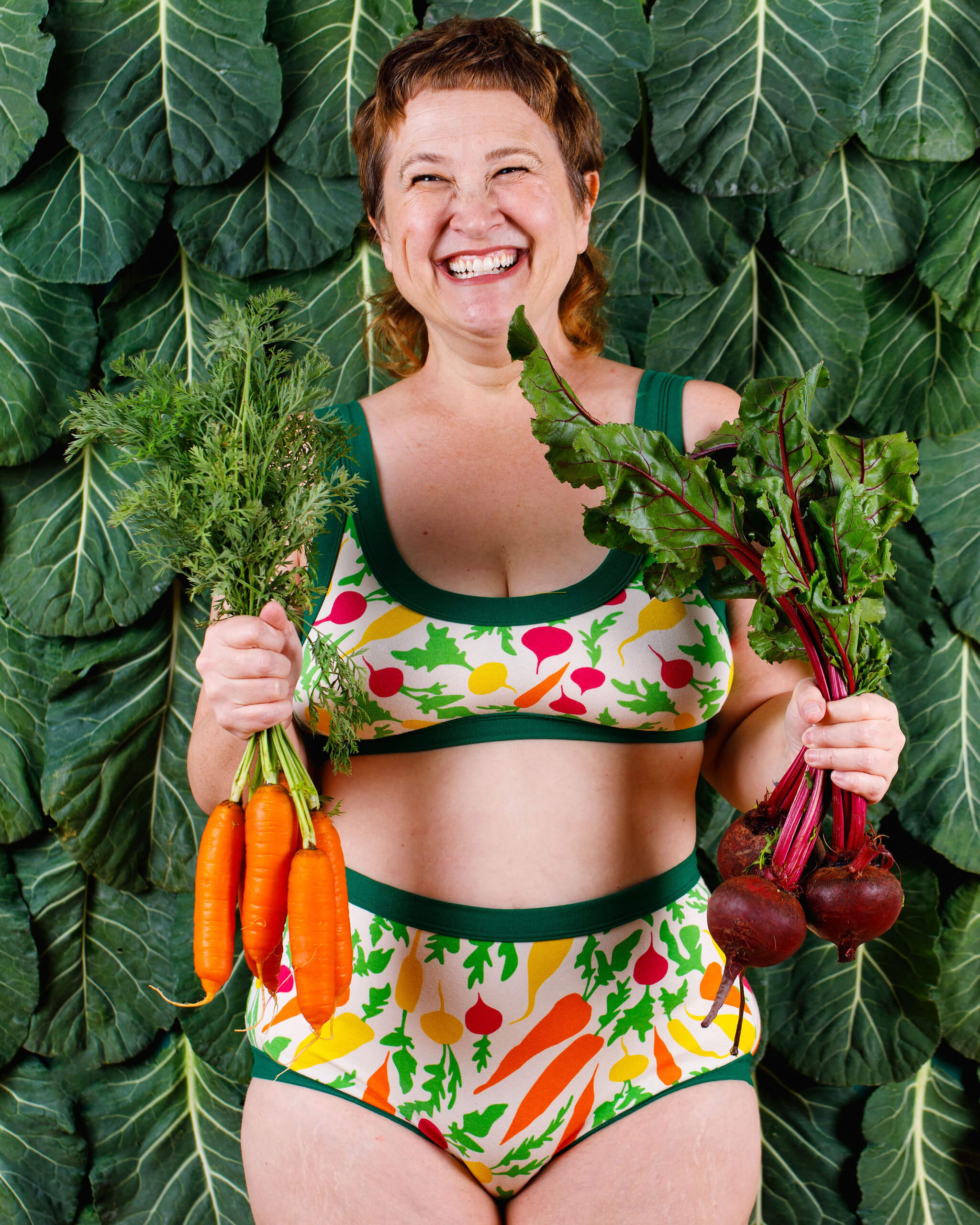 Model wearing a set of Thunderpants Original style underwear and Bralette in Root Veggies print.
