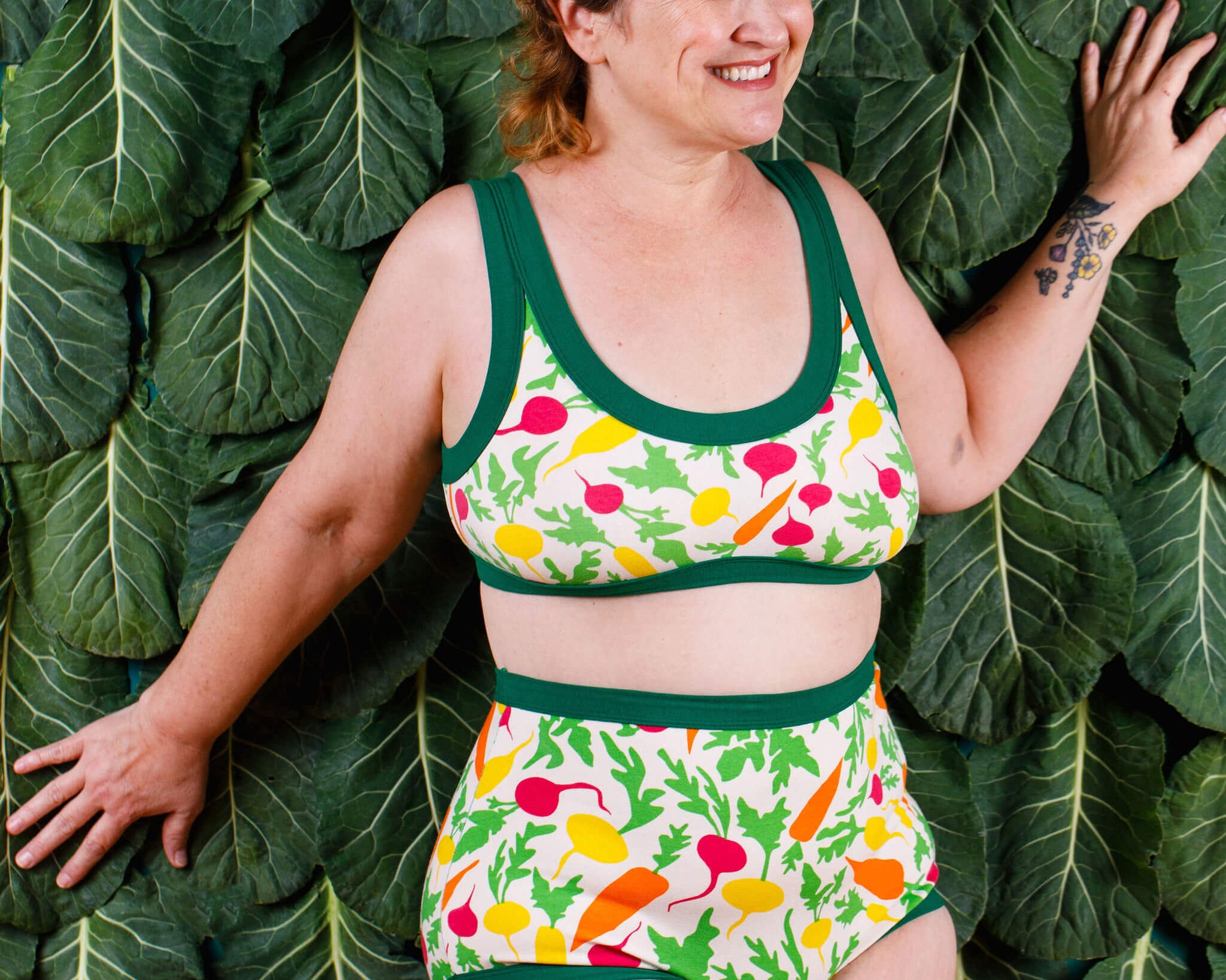 Model wearing a set of Thunderpants Sky Rise style underwear and Bralette in Root Veggies print.