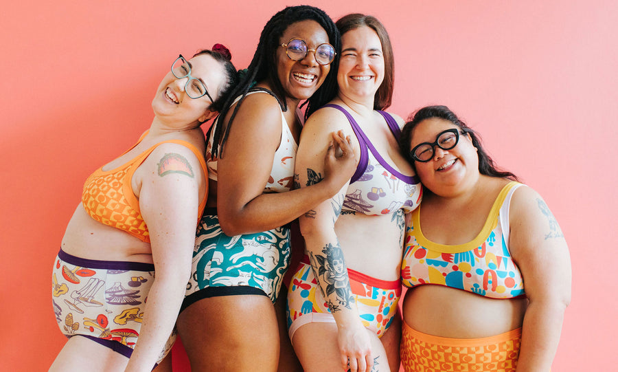 Four models smiling wearing various prints and styles of Thunderpants underwear and Bralettes.