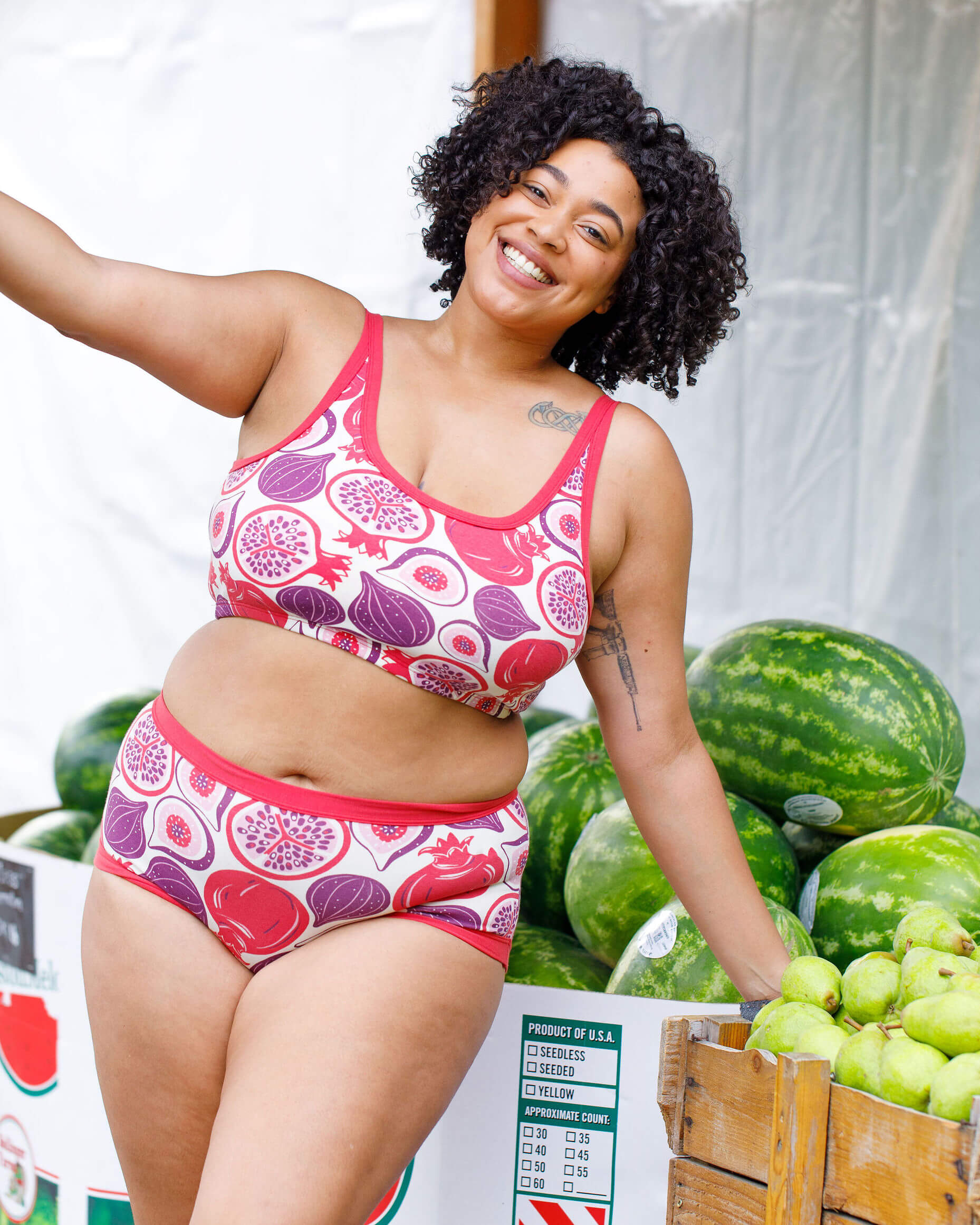 Model wearing Thunderpants Longline Bra and Original style underwear in Two Fruits - pomegranates and figs.