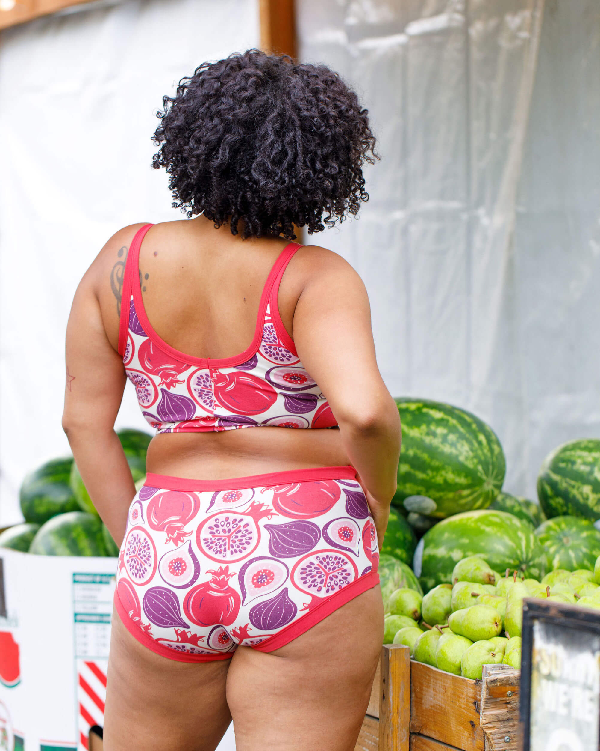 Model wearing Thunderpants Original style underwear and Longline Bra in Two Fruits - pomegranates and figs.