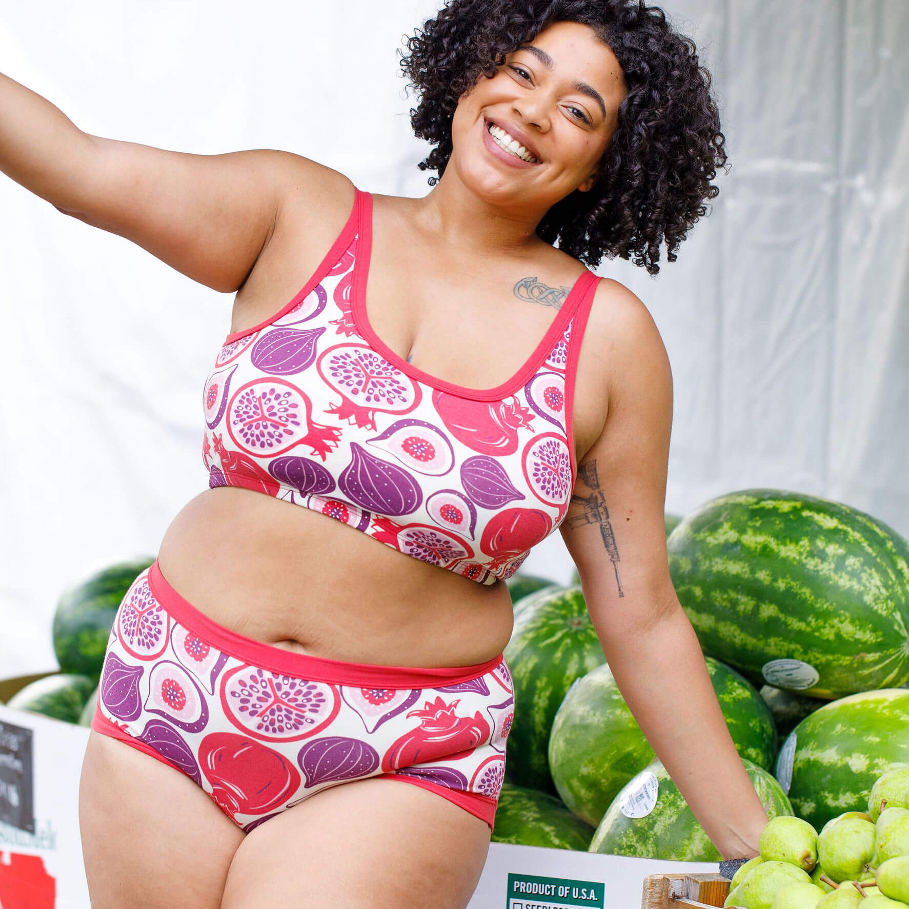 Model wearing Thunderpants Original style underwear and Longline Bra in Two Fruits - pomegranates and figs.