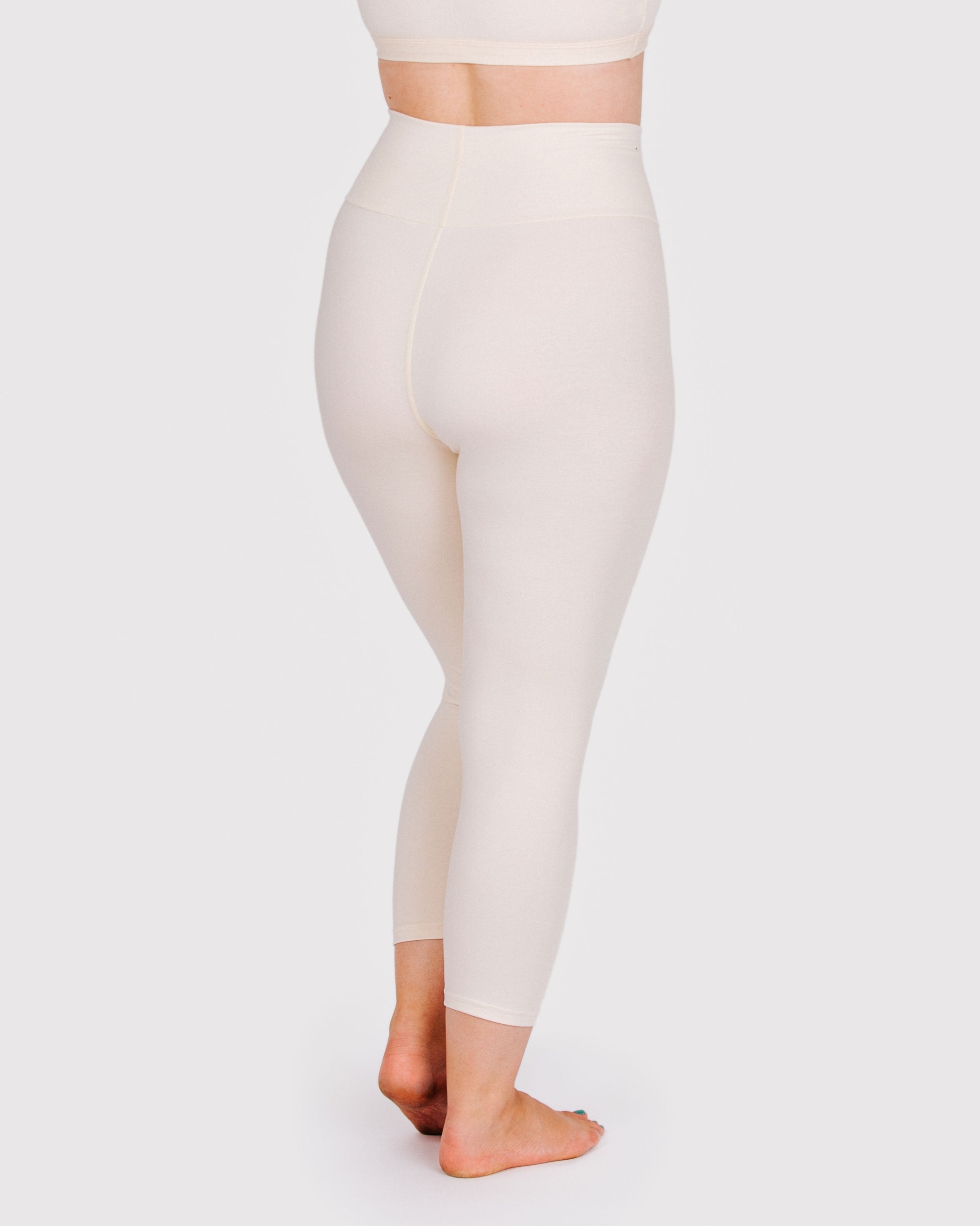 Fit photo from the back of Thunderpants organic cotton 3/4 Length Leggings in off-white on a model.