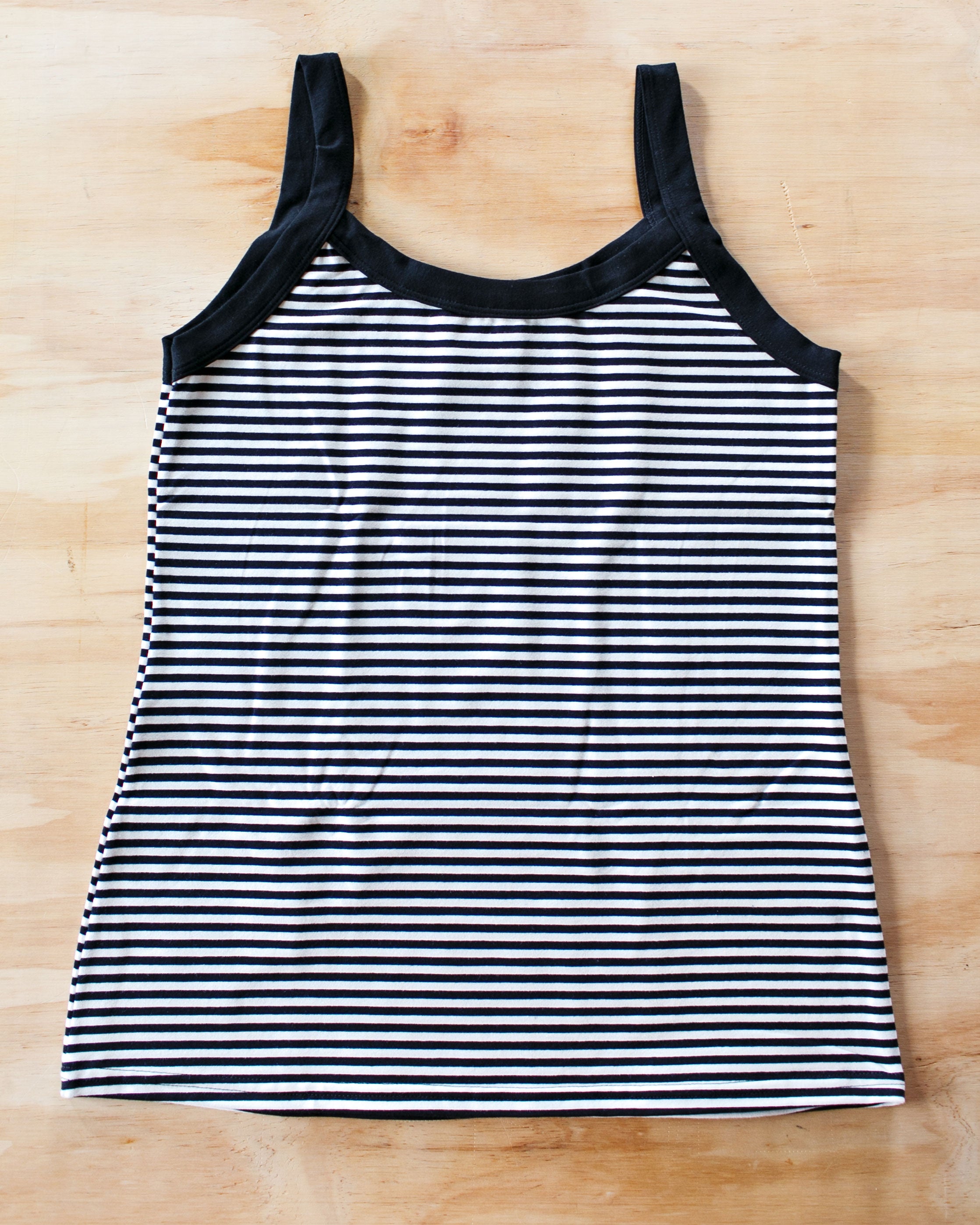 Flat lay of Thunderpants organic cotton Camisole in Black and White Stripes.