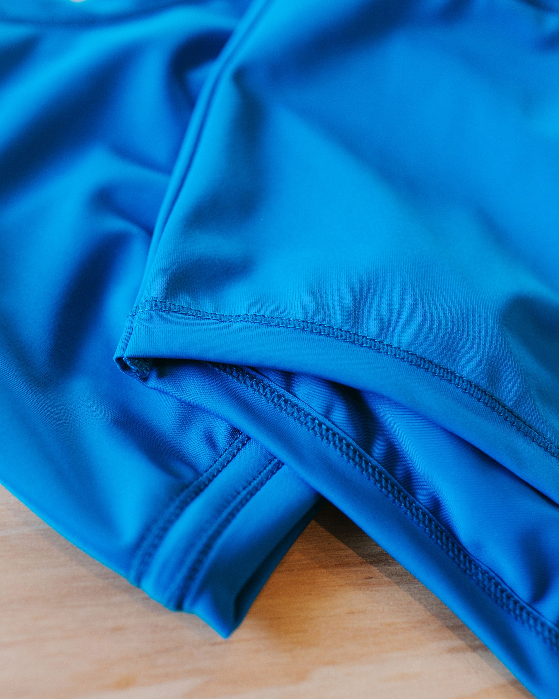 Close up of Marina Blue Swimwear, showing stitching and detail.