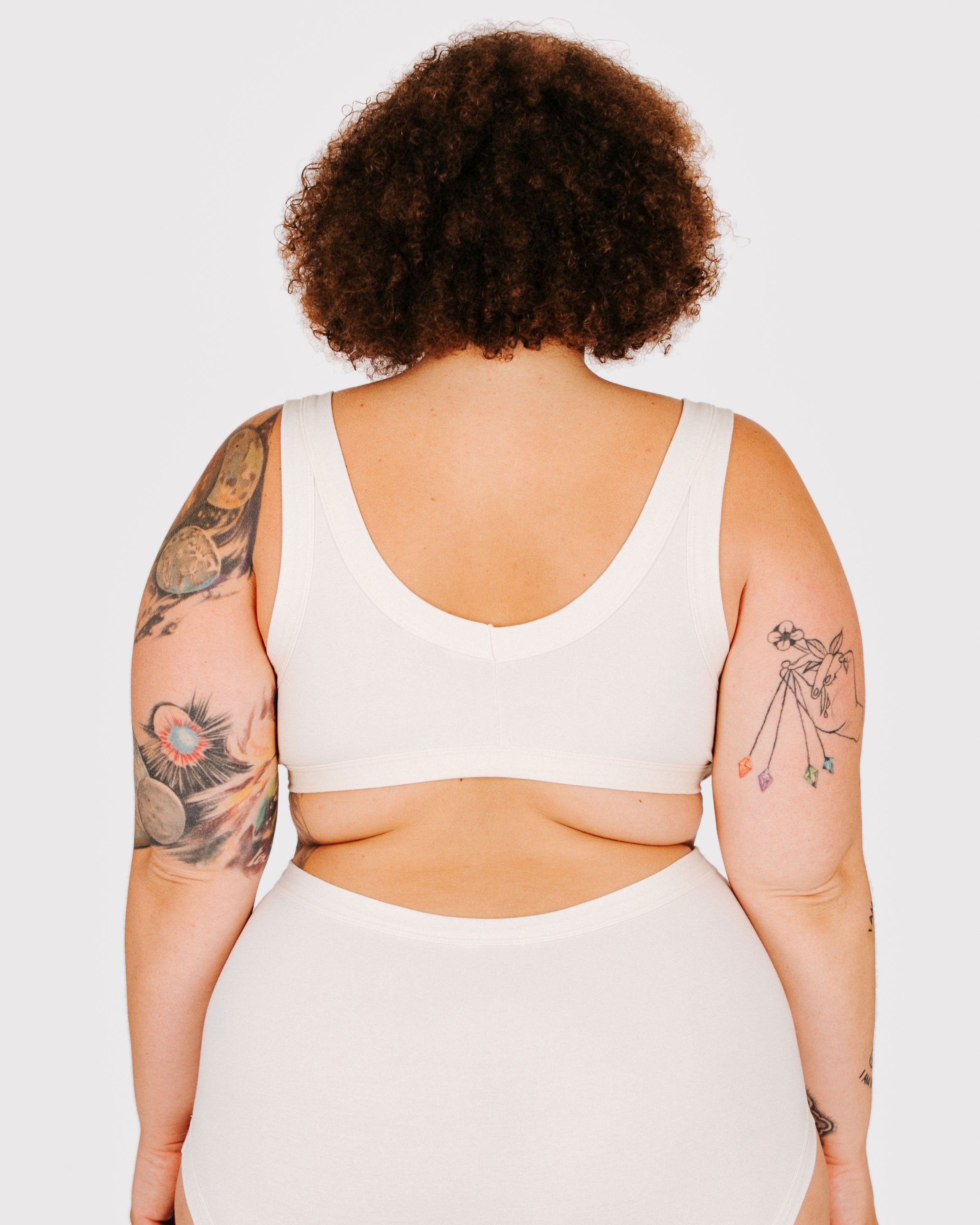 Fit photo from the back of Thunderpants organic cotton Bralette and Original Style underwear in off-white on a model.