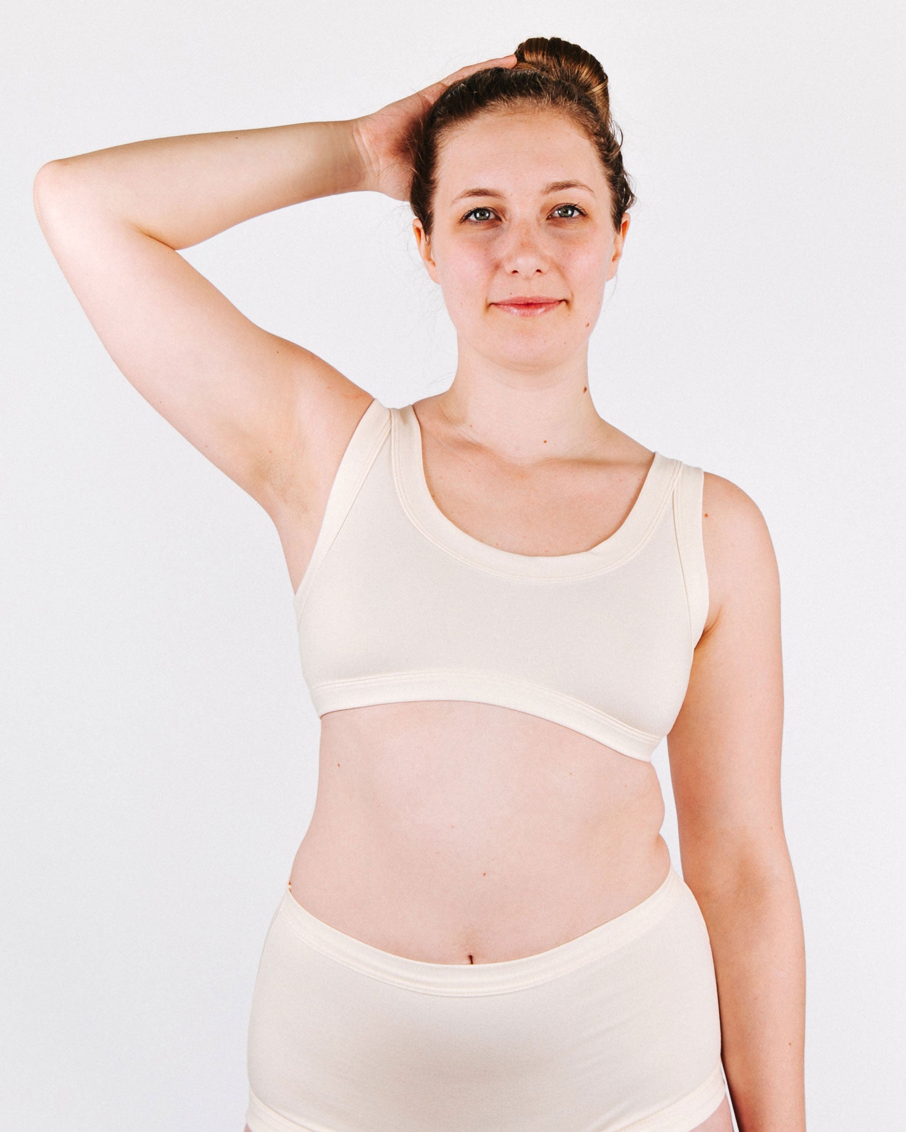 Fit photo from the front of Thunderpants organic cotton Bralette and Original Style underwear in off-white on model.